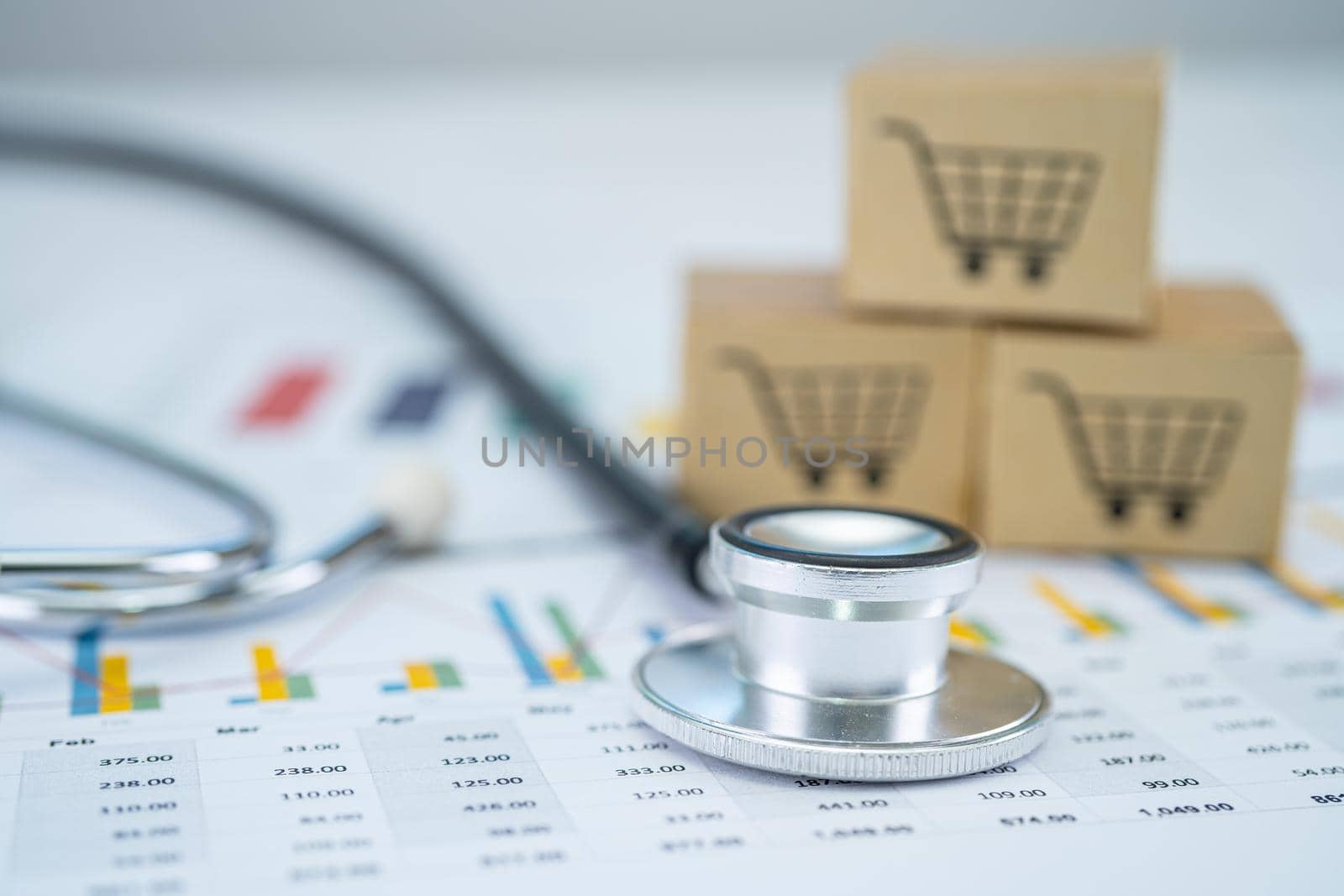 Stethoscope and shopping cart logo on box with graph background. Banking Account, Investment Analytic research data economy, trading, Business import export transportation online company concept. by pamai