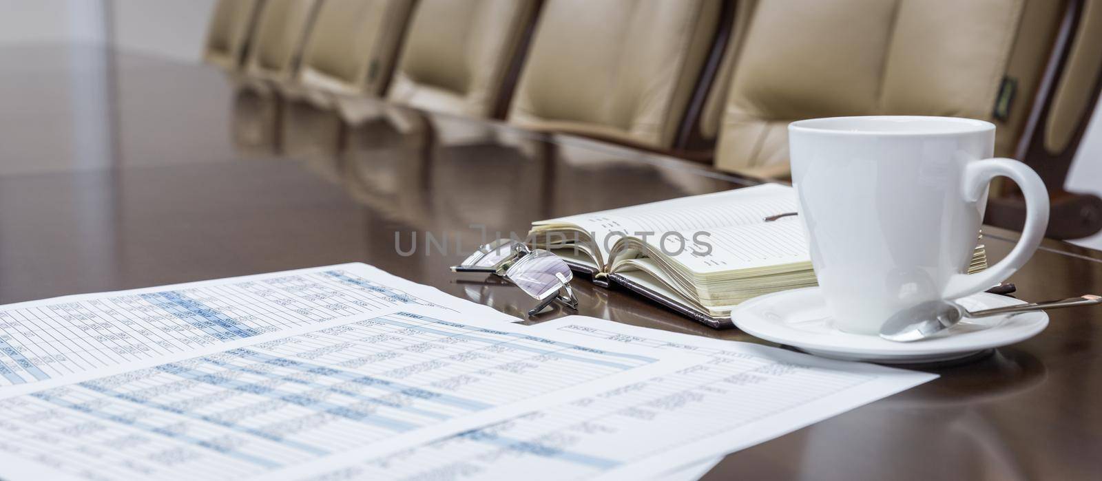 Business papers in conference room before meeting in office