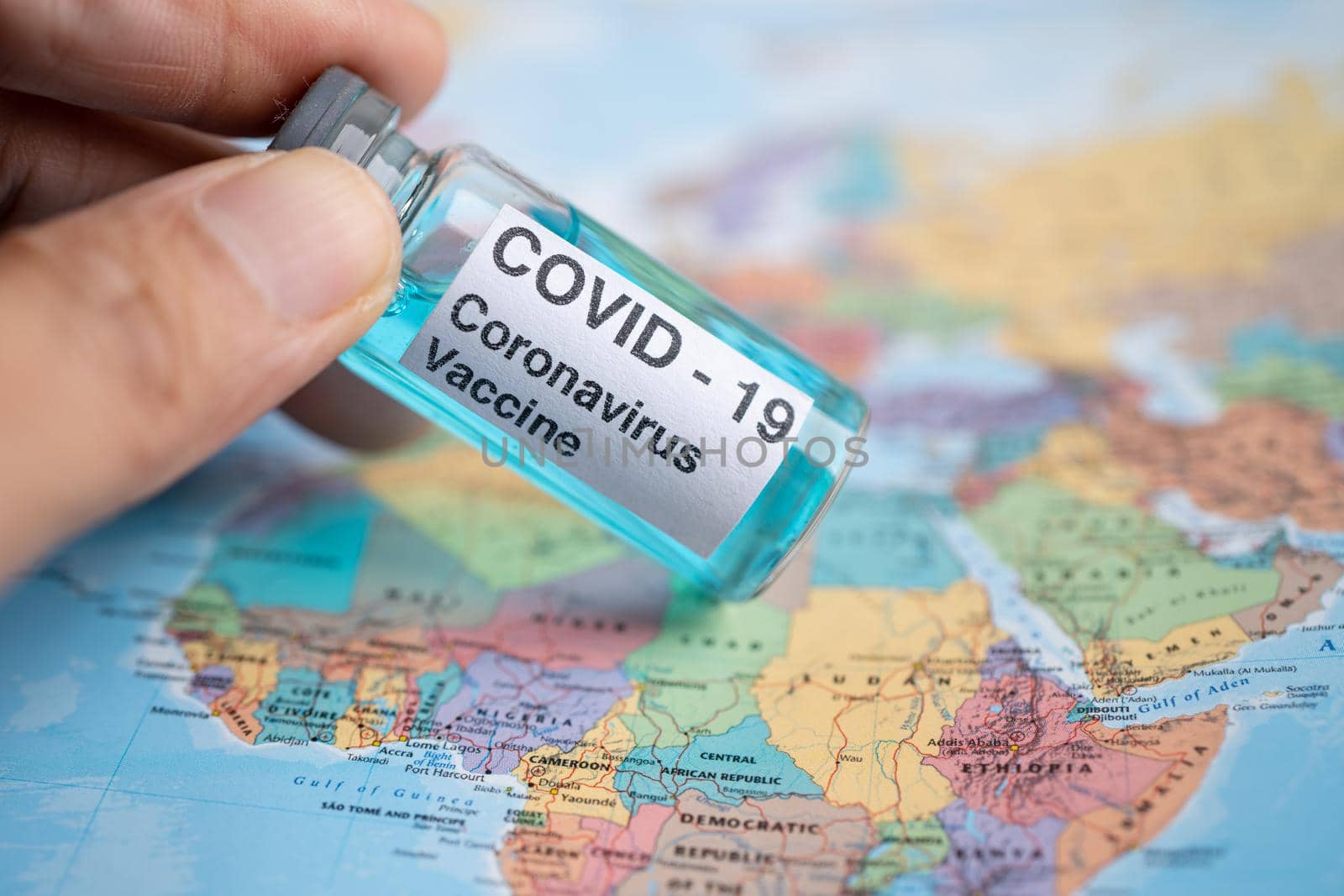 Bangkok, Thailand - July 1, 2021, Coronavirus Covid-19 vaccine on Africa map, development medical for doctor use to treat pneumonia illness patients. by pamai