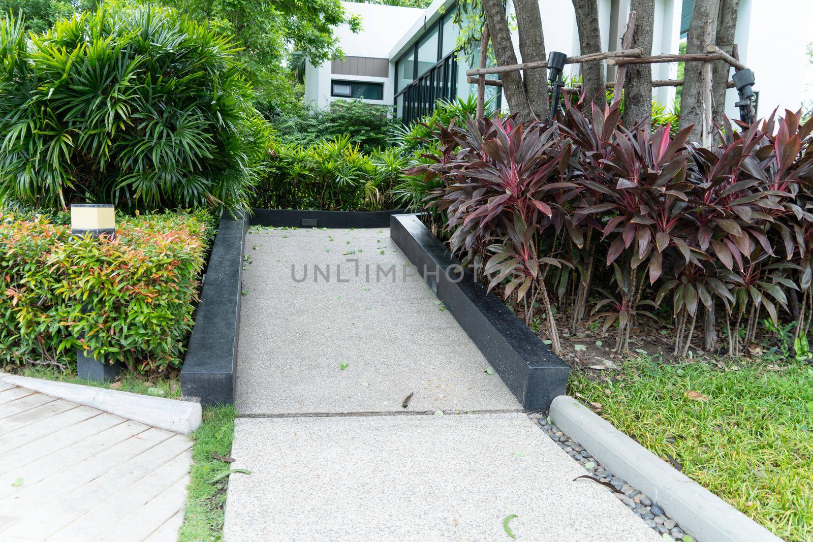 Building entrance trail with ramp for elder old or cannot self help people disabled person wheelchair.