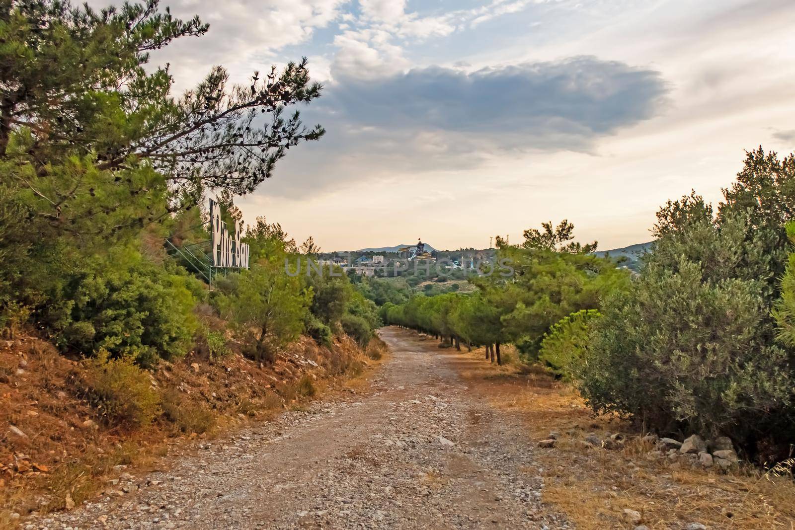 kusadasi,aydin,turkey- july 24,2021.seascape, green nature and sportive trekking paths in kusadasi in early morning time and summer season.