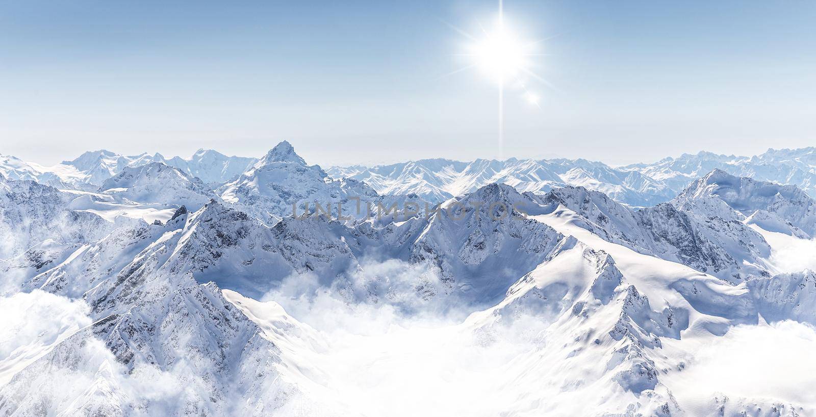Panorama of winter mountains in Caucasus region, Russia, view from Elbrus mountain