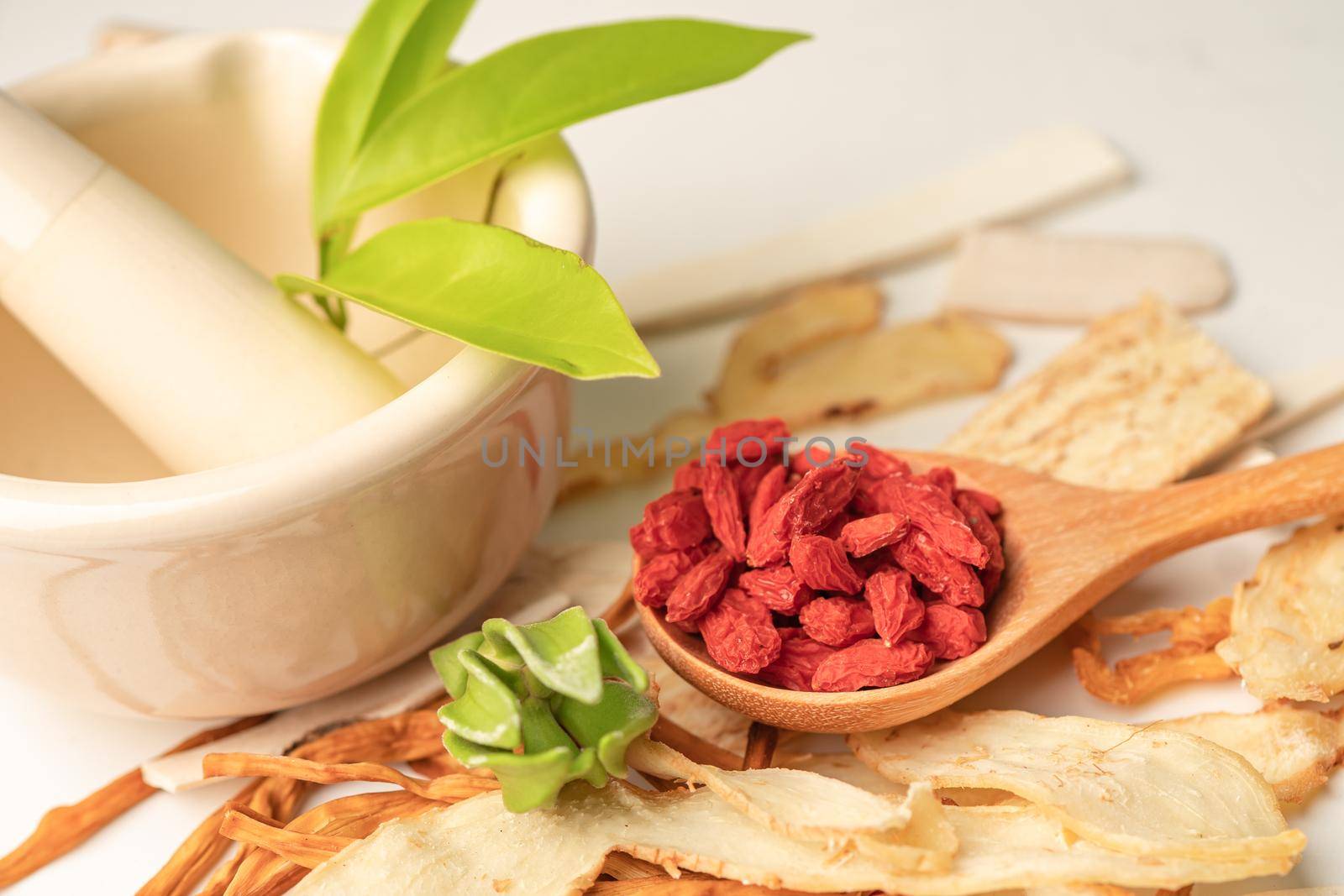 Chinese herb medicine with goji berries for good healthy.