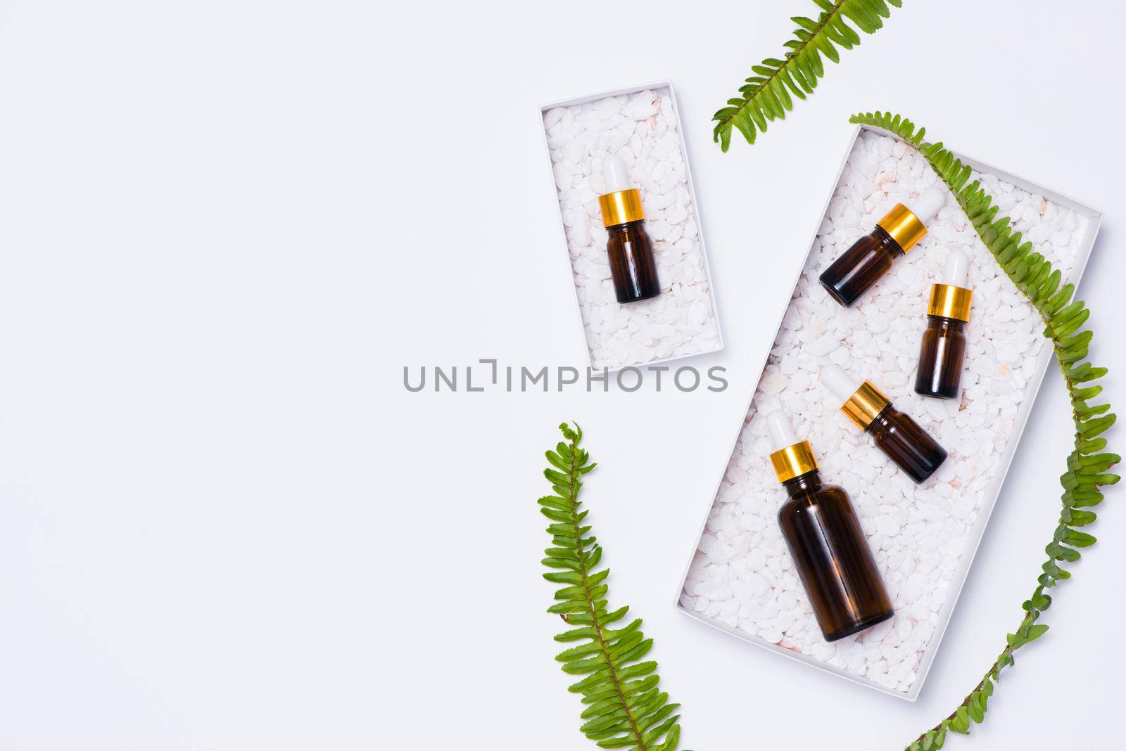 Branding mock-up. Natural essential oil. Natural beauty product concept. by makidotvn
