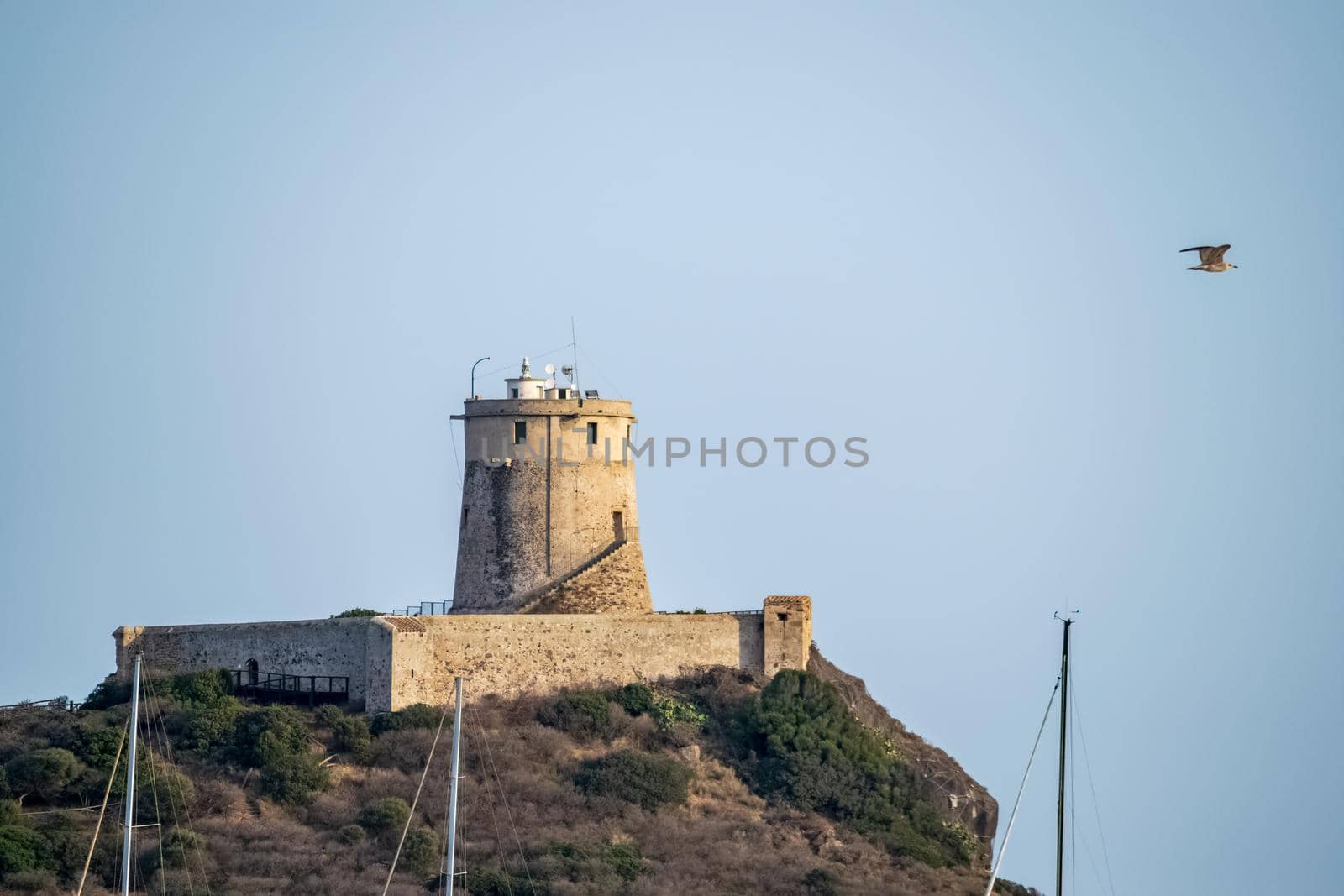 Closeup of the beautiful and characteristic Coltellazzo Tower, Nora, Sardinia, Italy.