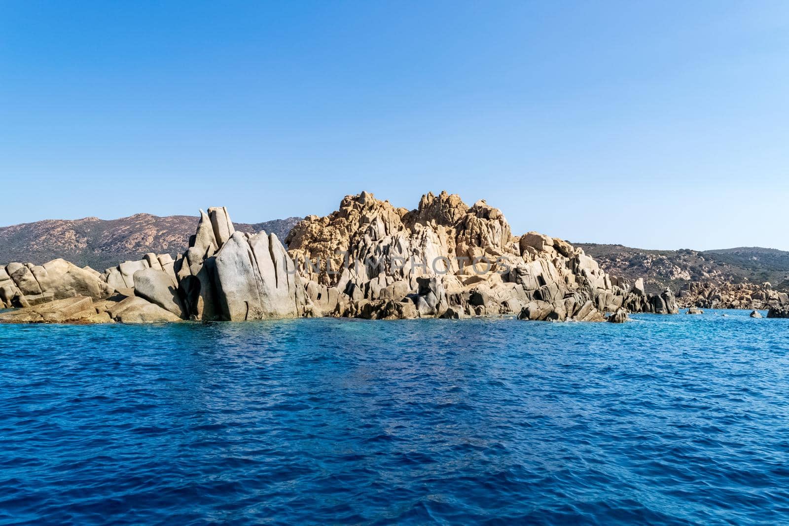 Beautiful view of the southern Sardinian sea from the boat. Note the particular rock formations.