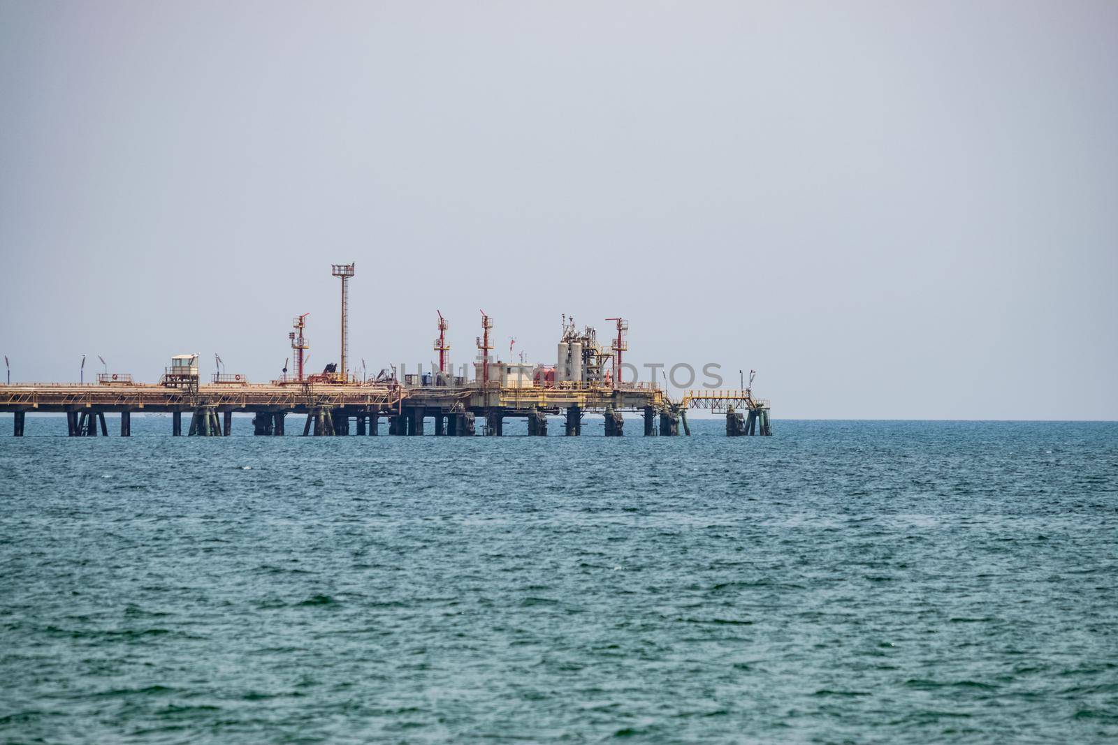 View of an oil pipeline and a dock for oil tankers.