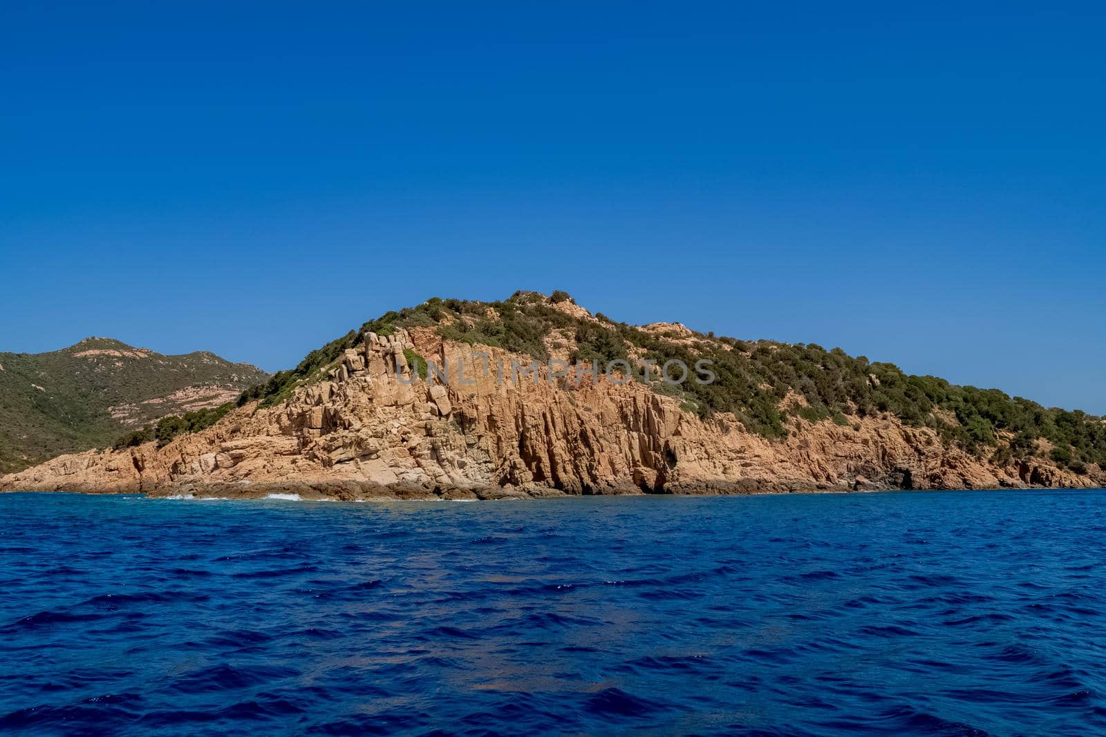 Beautiful view of the southern Sardinian sea from the boat. Note the particular rock formations.