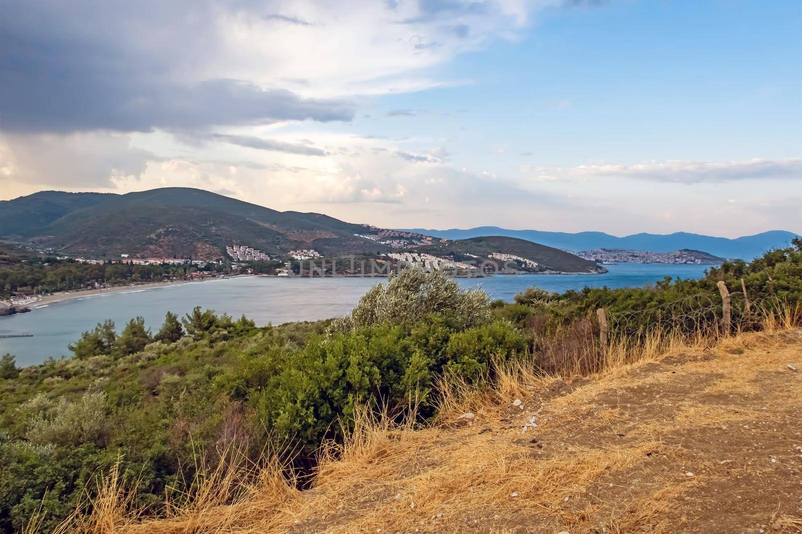 kusadasi,aydin,turkey- july 24,2021.seascape, green nature and sportive trekking paths in kusadasi in early morning time and summer season.