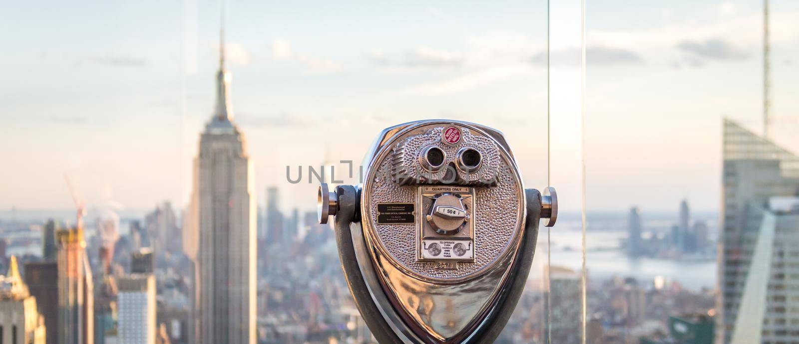 New york, USA - May 17, 2019: Binoculars looking at skyline in midtown Manhattan, New York City, USA