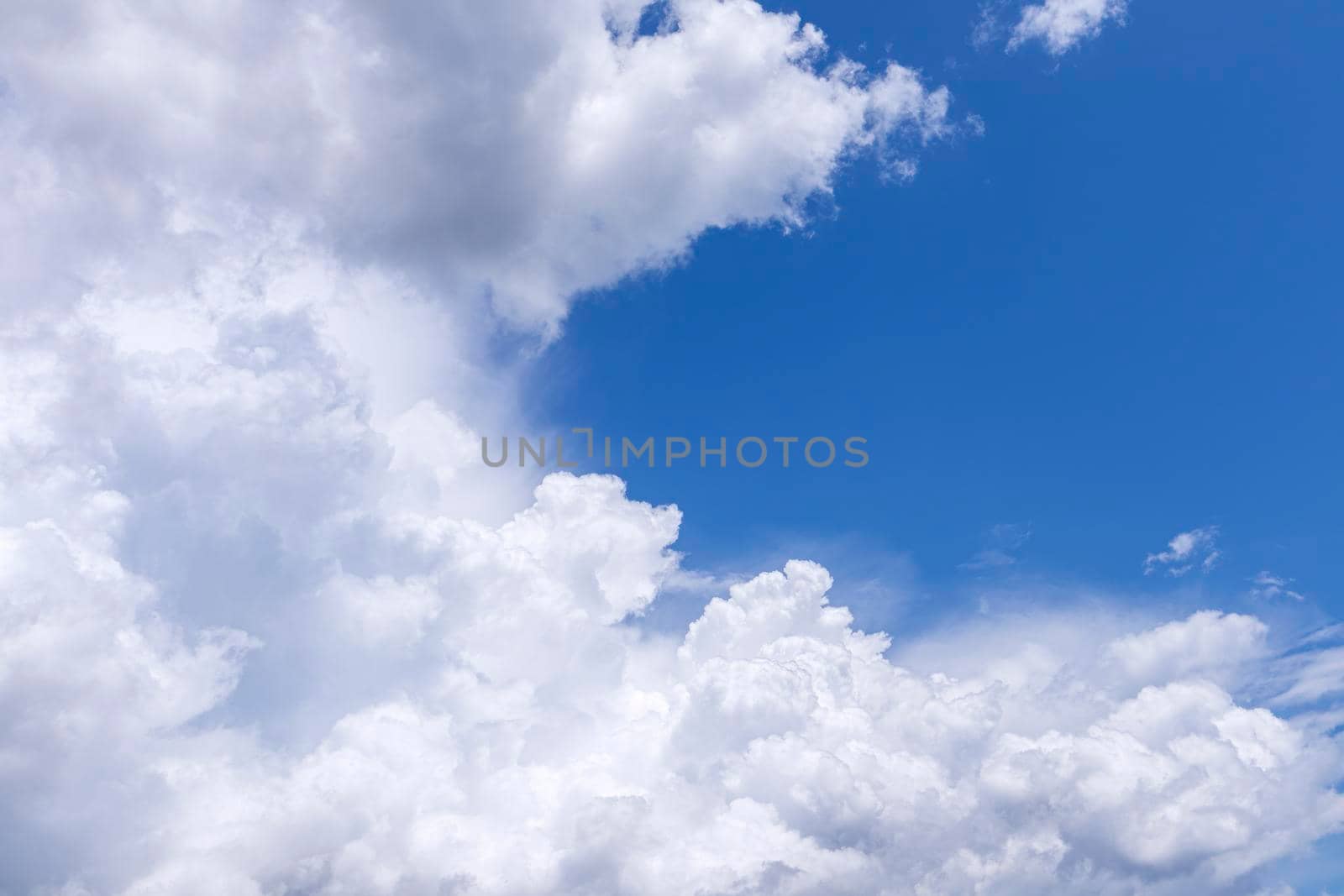 beautiful clouds on the blue sky as a background. High quality photo