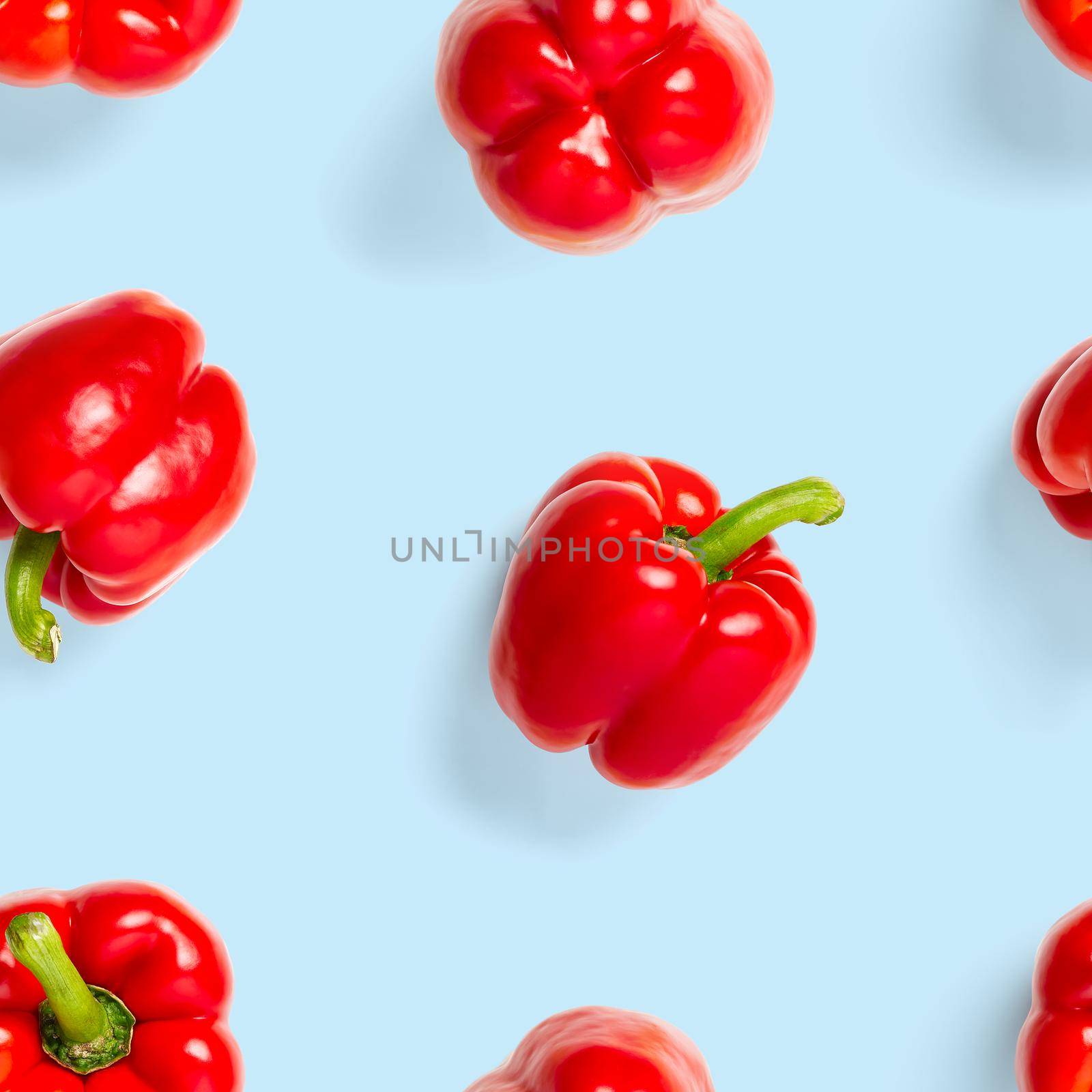 seamless pattern of bulgarian red pepper on blue background. wallpaper, print pattern, top view, flat layout, isolated by PhotoTime