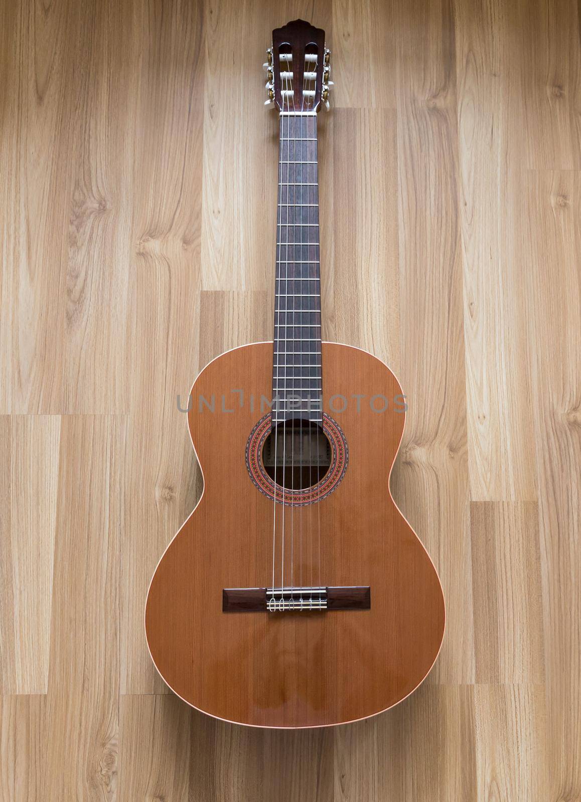 A classical guitar with six nylon strings