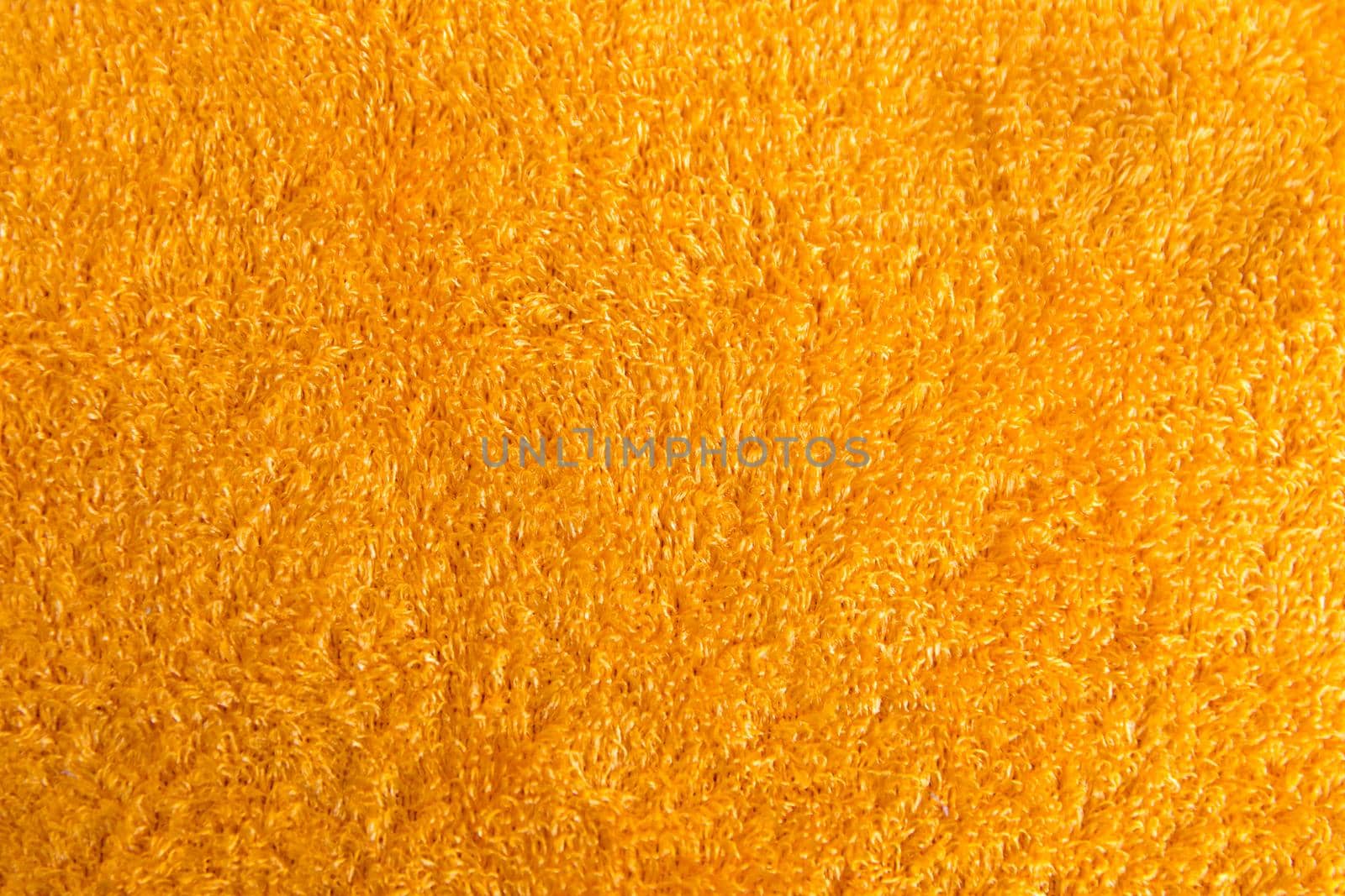 a bright shiny orange soft towel background