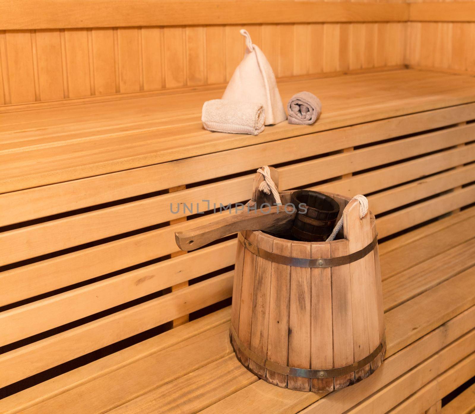 Inside view of traditional sauna with some equipment