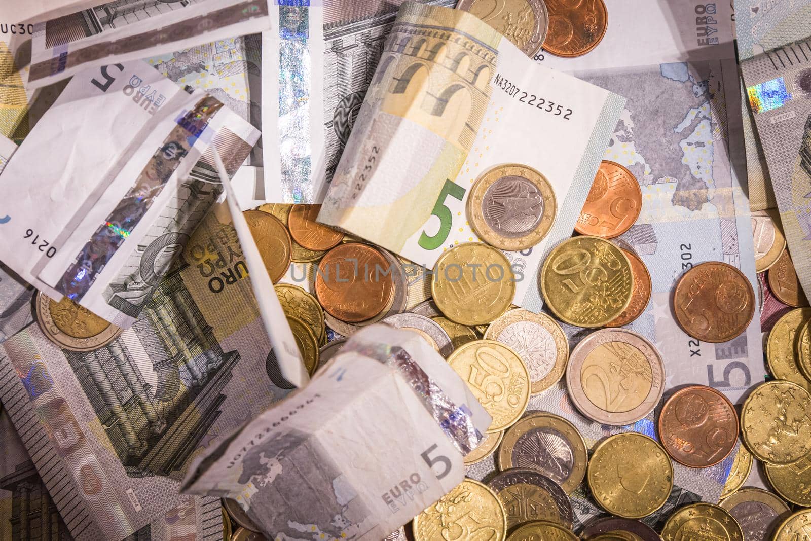 Euro money: closeup of banknotes and coins