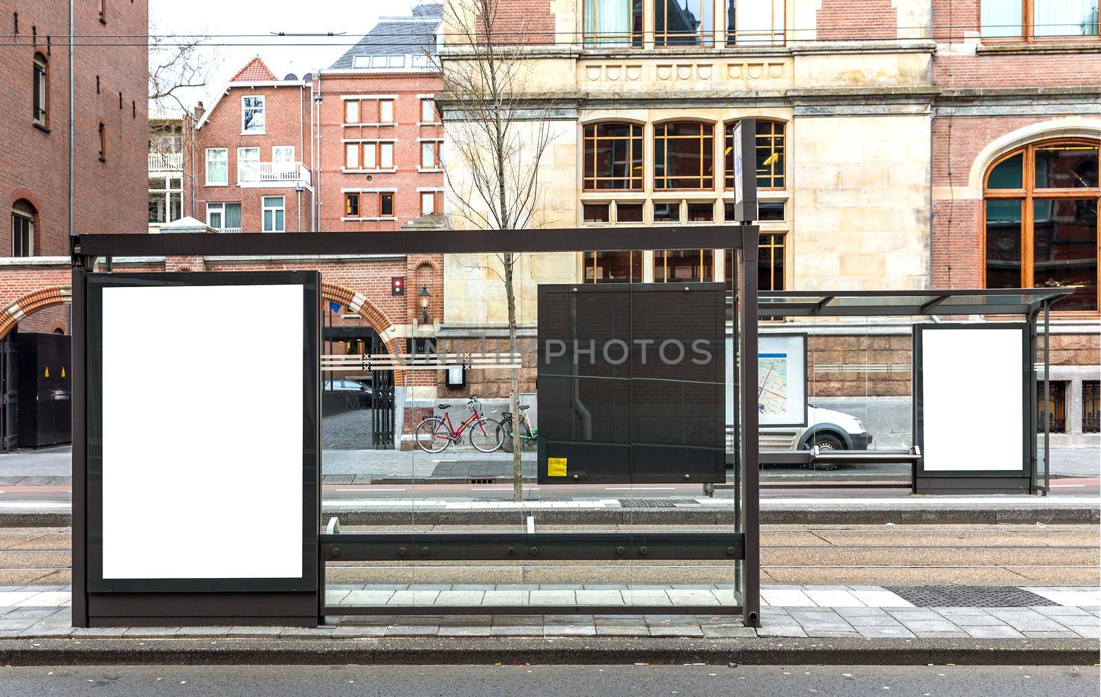 Blank billboard on a roadside in european town