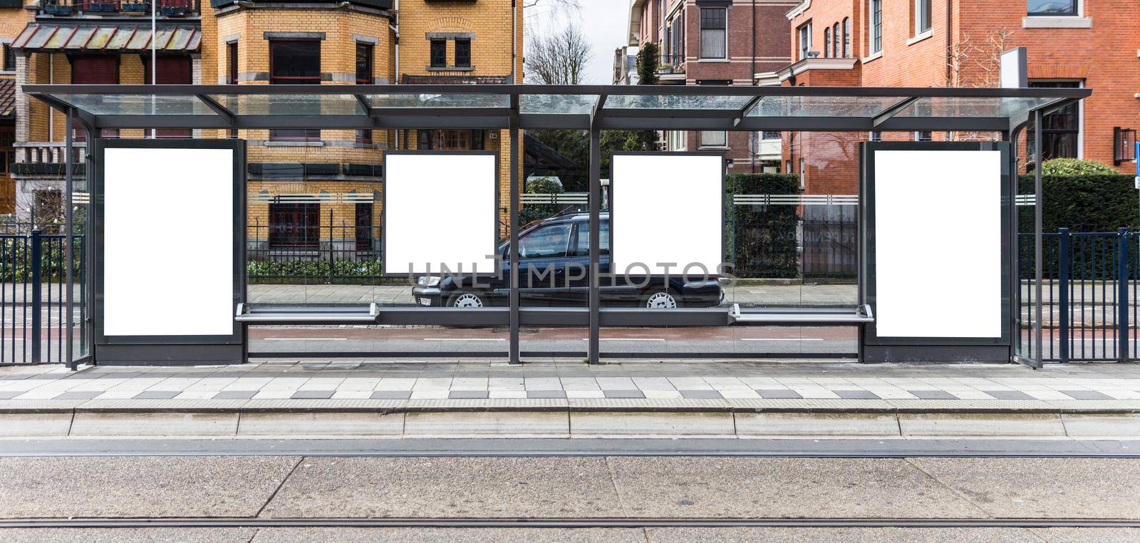 Blank billboard on a roadside in european town