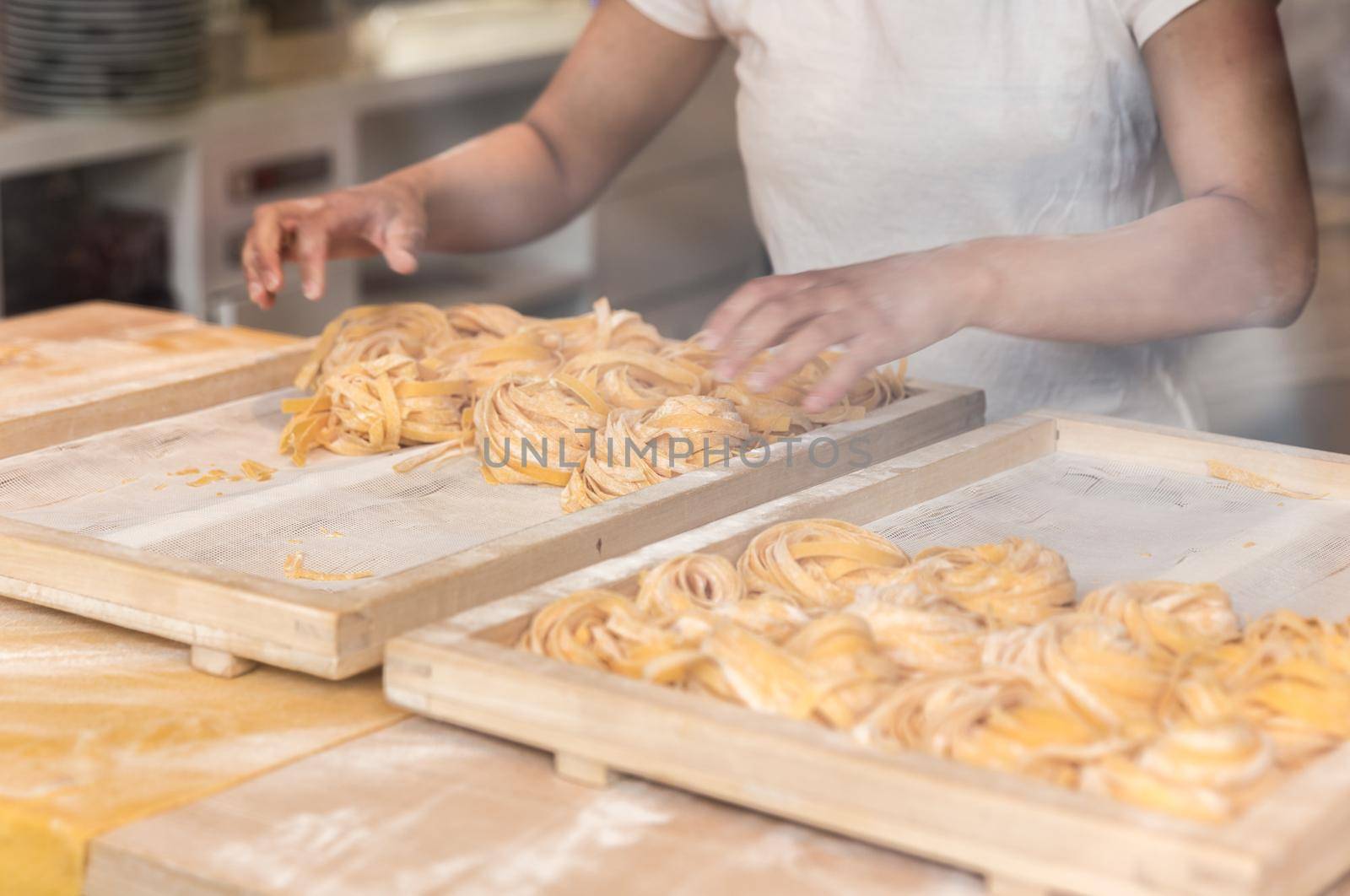 Making homemade italian pasta tagliatelle
