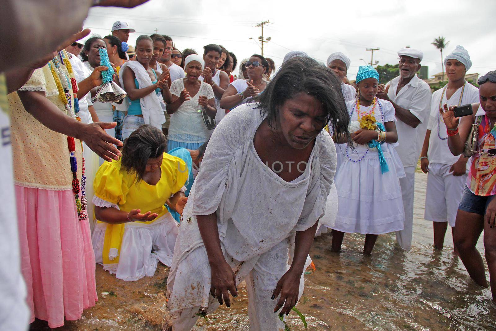 salvador, bahia, brazil - february 2, 2014: Integrants of the Candomble religion are seen during celebrations in honor of Orixa Yemanja on a beach in the city of Salvador.
