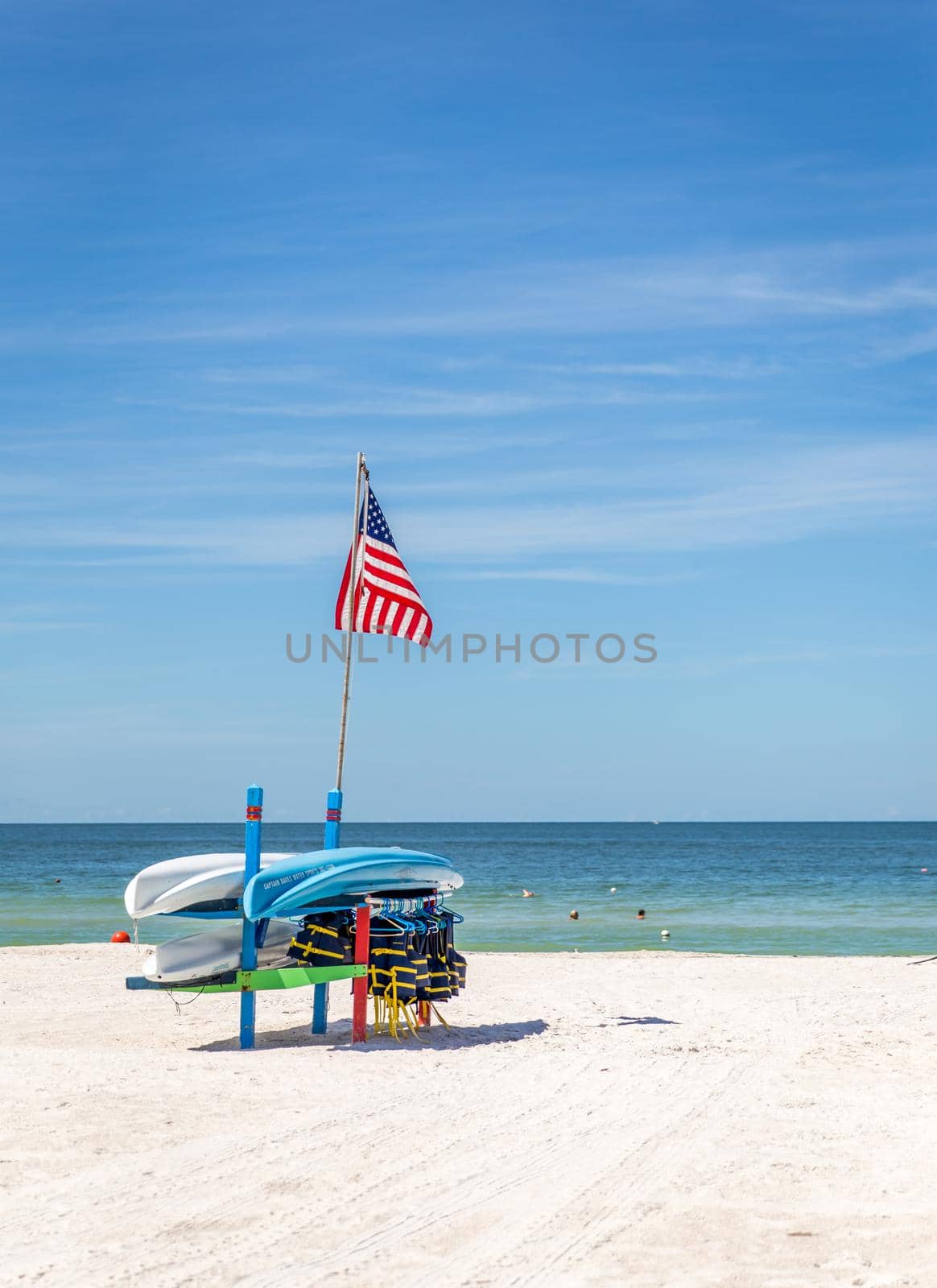 ST.PETE BEACH, FLORIDA, USA - SEPTEMBER 03, 2014: Life jackets and boats on St.Pete beach in Florida, on September, 2014, USA.