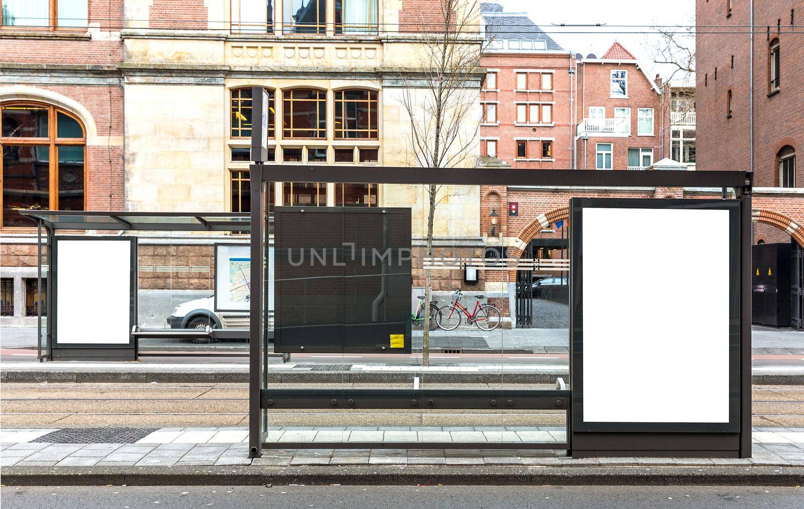 Blank billboard on a roadside in european town