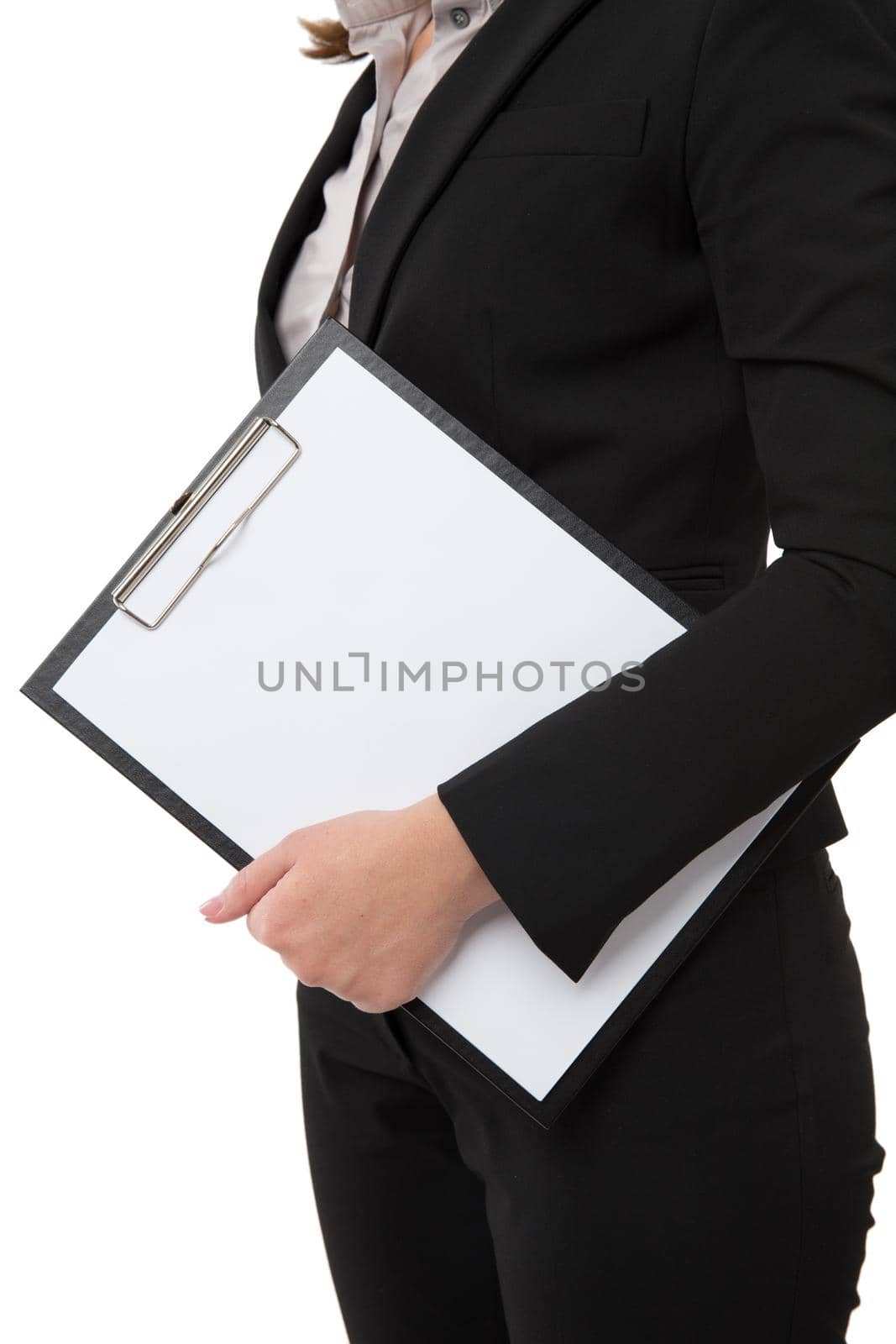 A pretty businesswoman carrying an empty clipboard