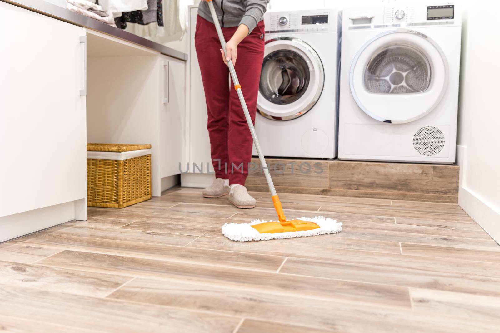 Cleaning floor in laundry room