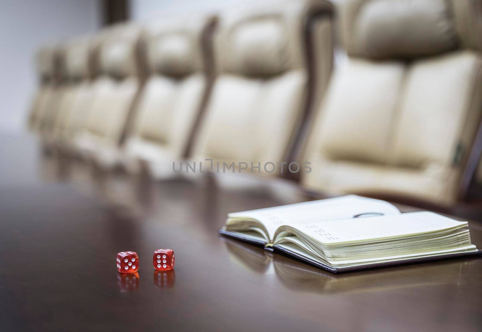 Closeup of on table in empty corporate conference room before business meeting in office