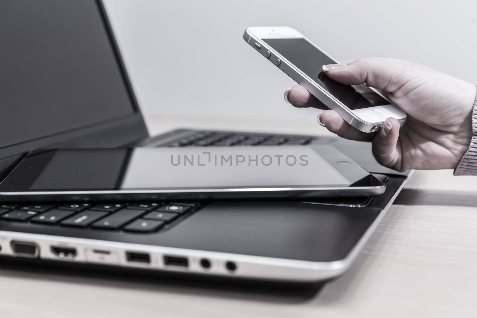Modern electronic devices - laptop, tablet and telephone