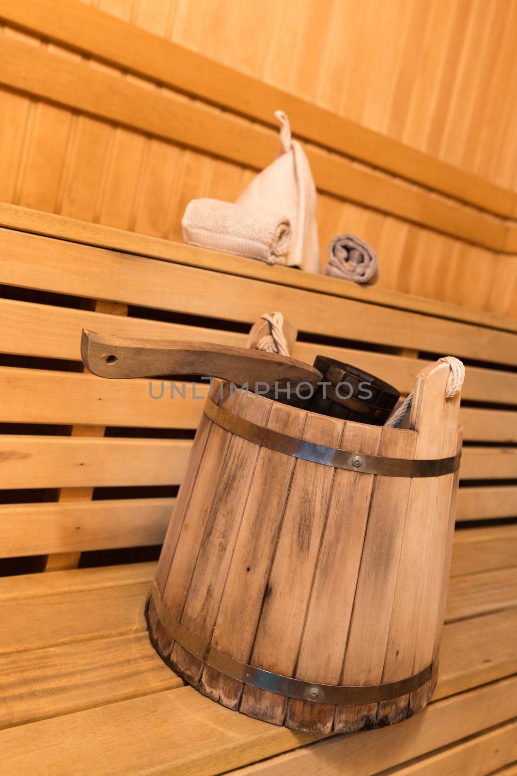 Inside view of traditional sauna with some equipment