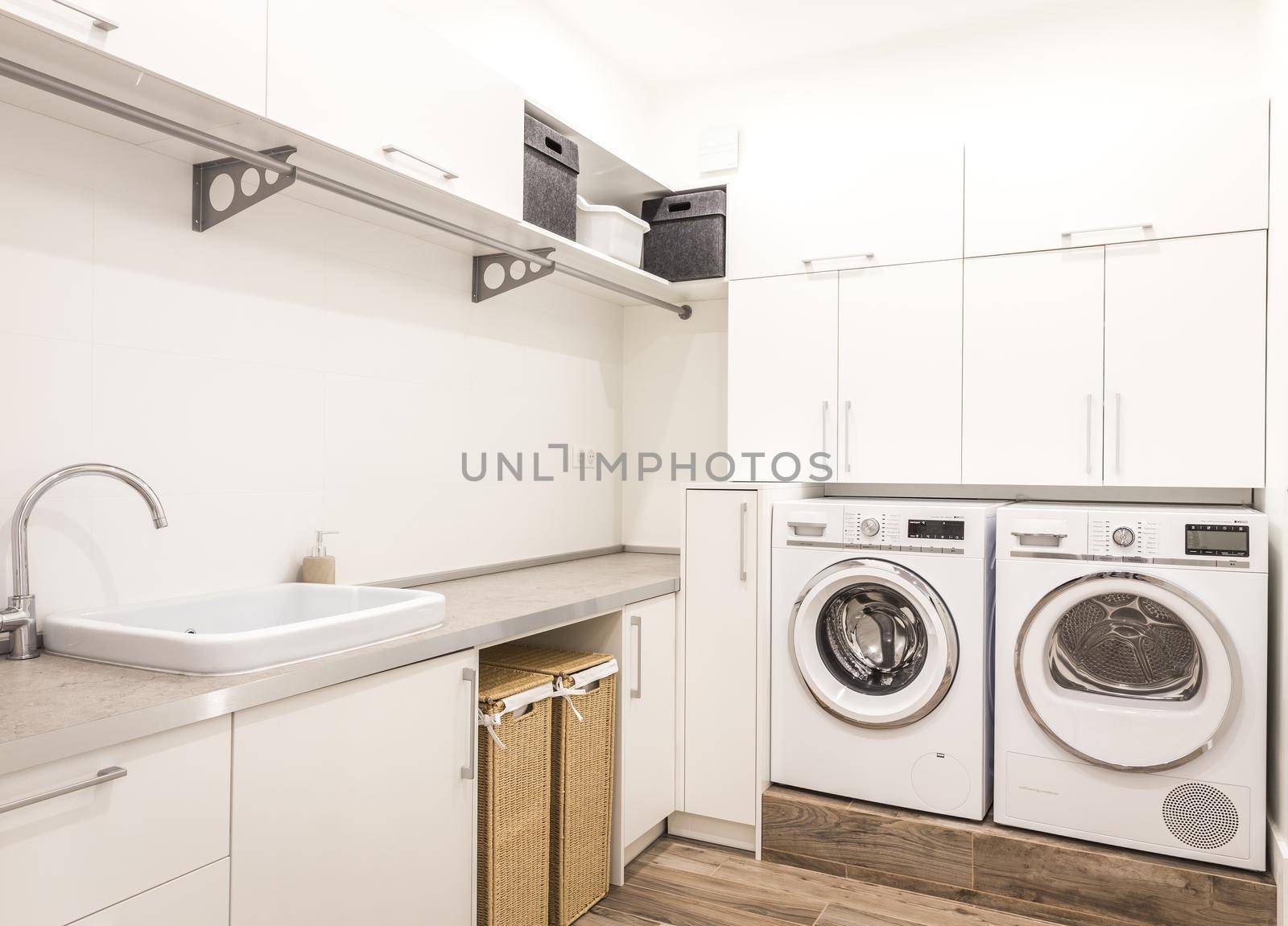 Laundry room with washing machine in modern home