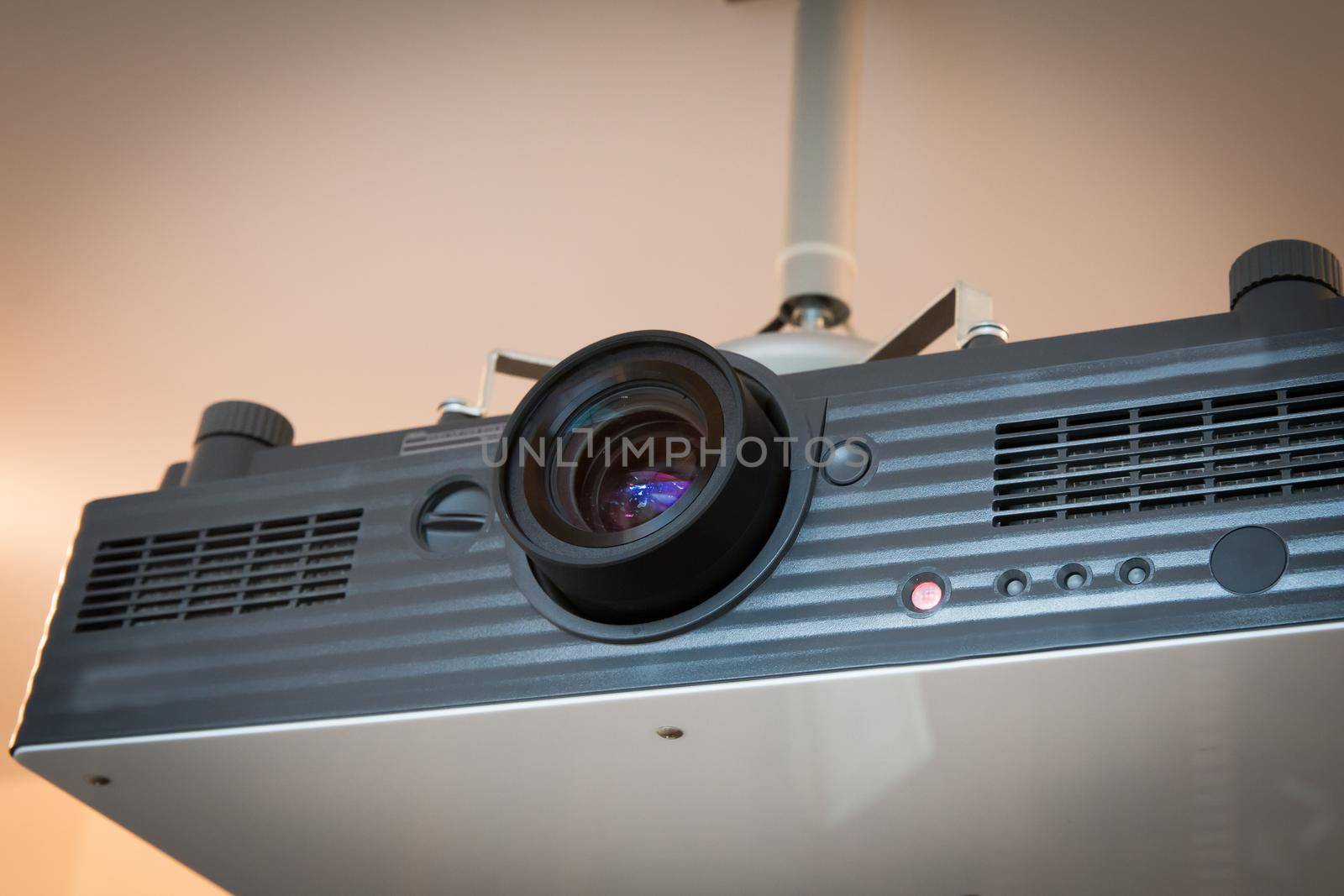 computer projector hanging in a conference hall