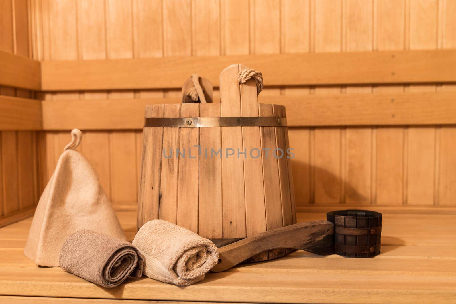 Inside view of traditional sauna with some equipment