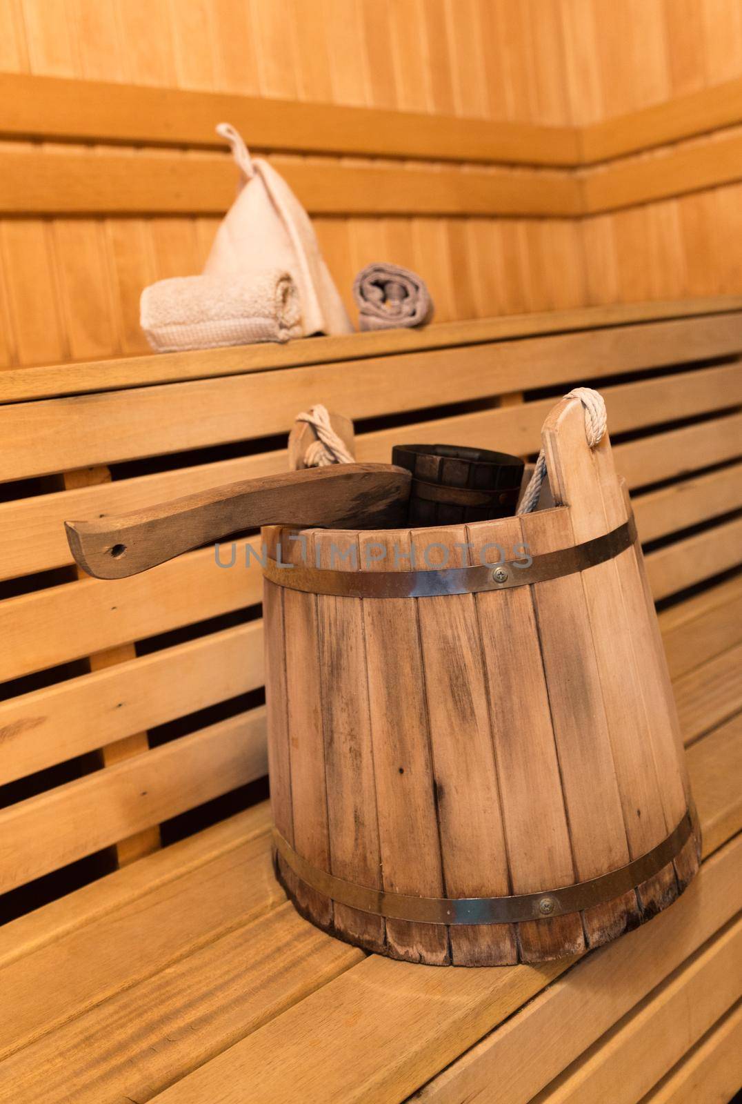 Inside view of traditional sauna with some equipment