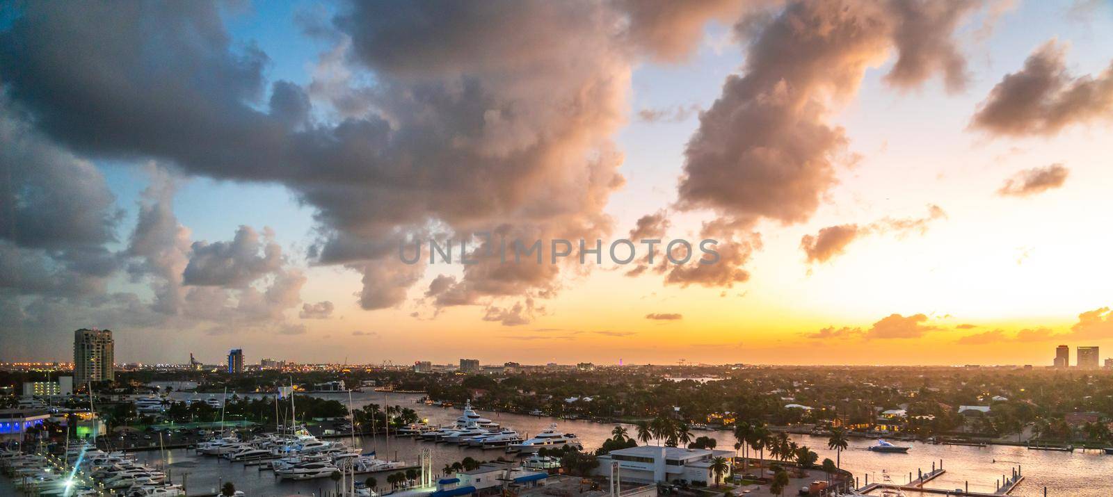 Aerial view of Fort Lauderdale waterway canals, residential homes and skyline