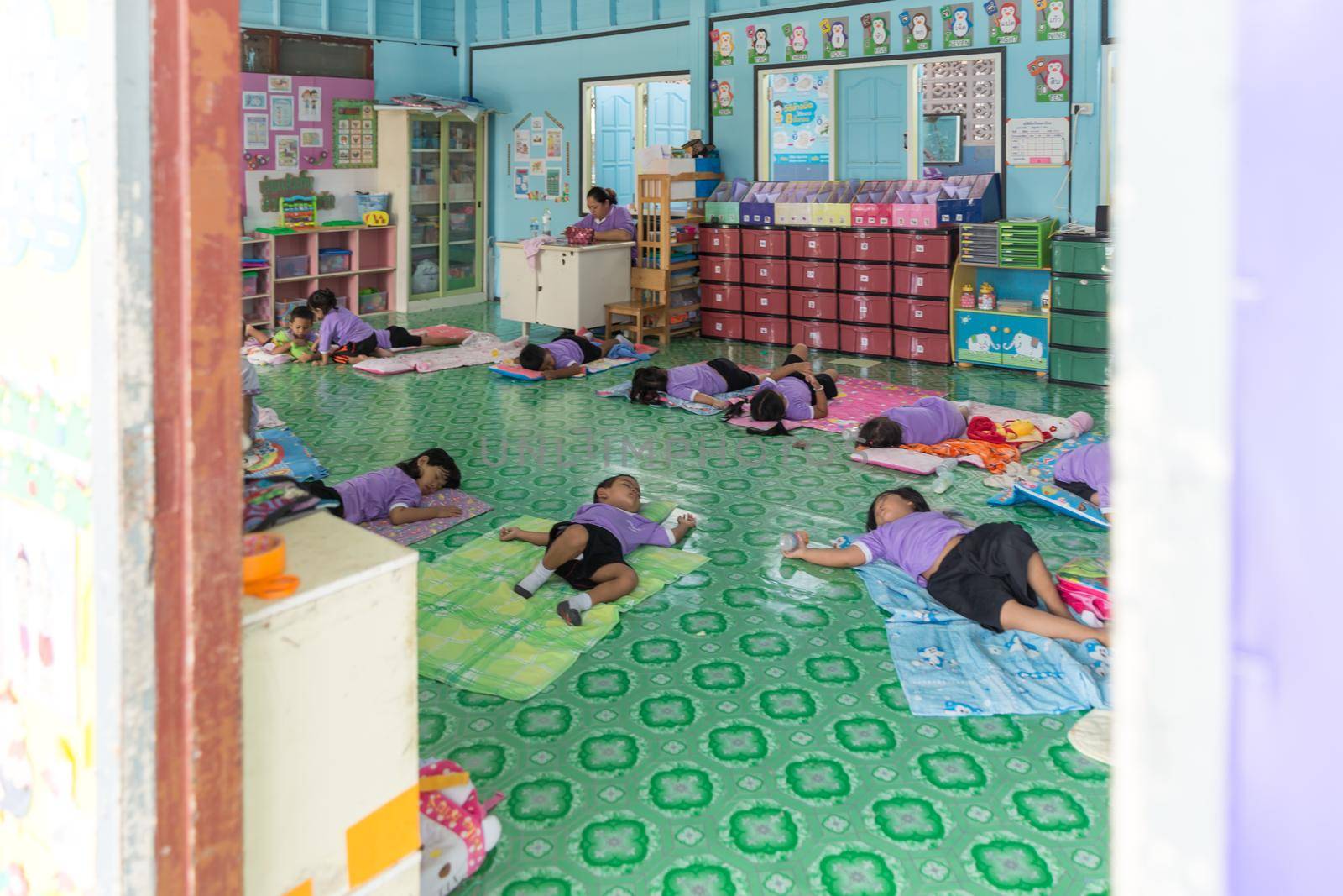 THAILAND, PHUKET - JANUARY 10, 2018 - Children are sleeping on floor in school in Ko Panyi the Gipsy village on water