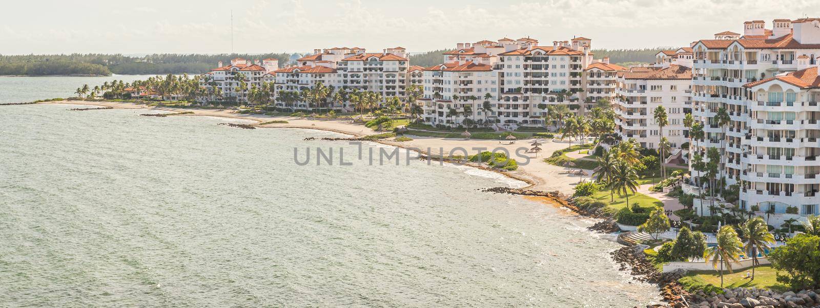 MIAMI, USA - SEPTEMBER 06, 2014 : Aerial drone view of apartments in Fisher Island on September 06, 2014 in Miami. by Mariakray