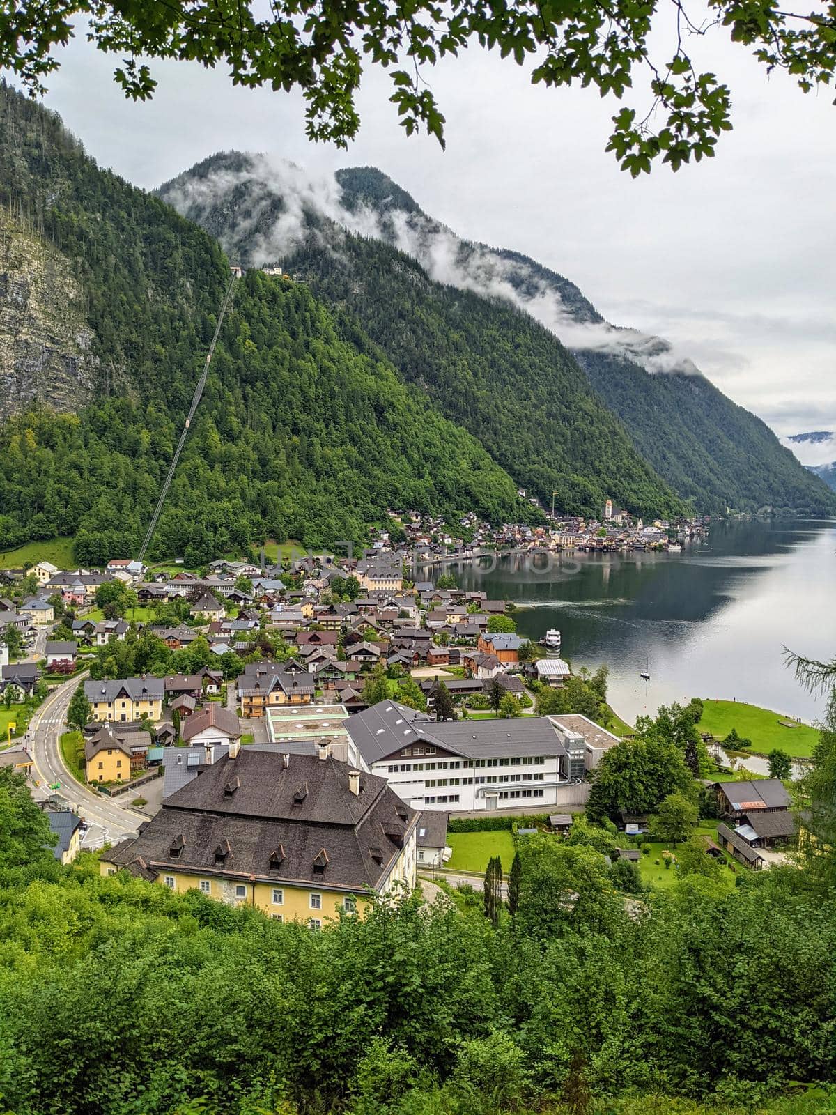 Hallstatt Austria city at lake and mountains panorama by weruskak