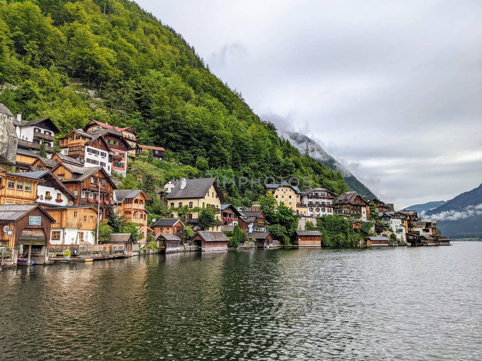 Hallstatt Austria city at lake and mountains panorama by weruskak