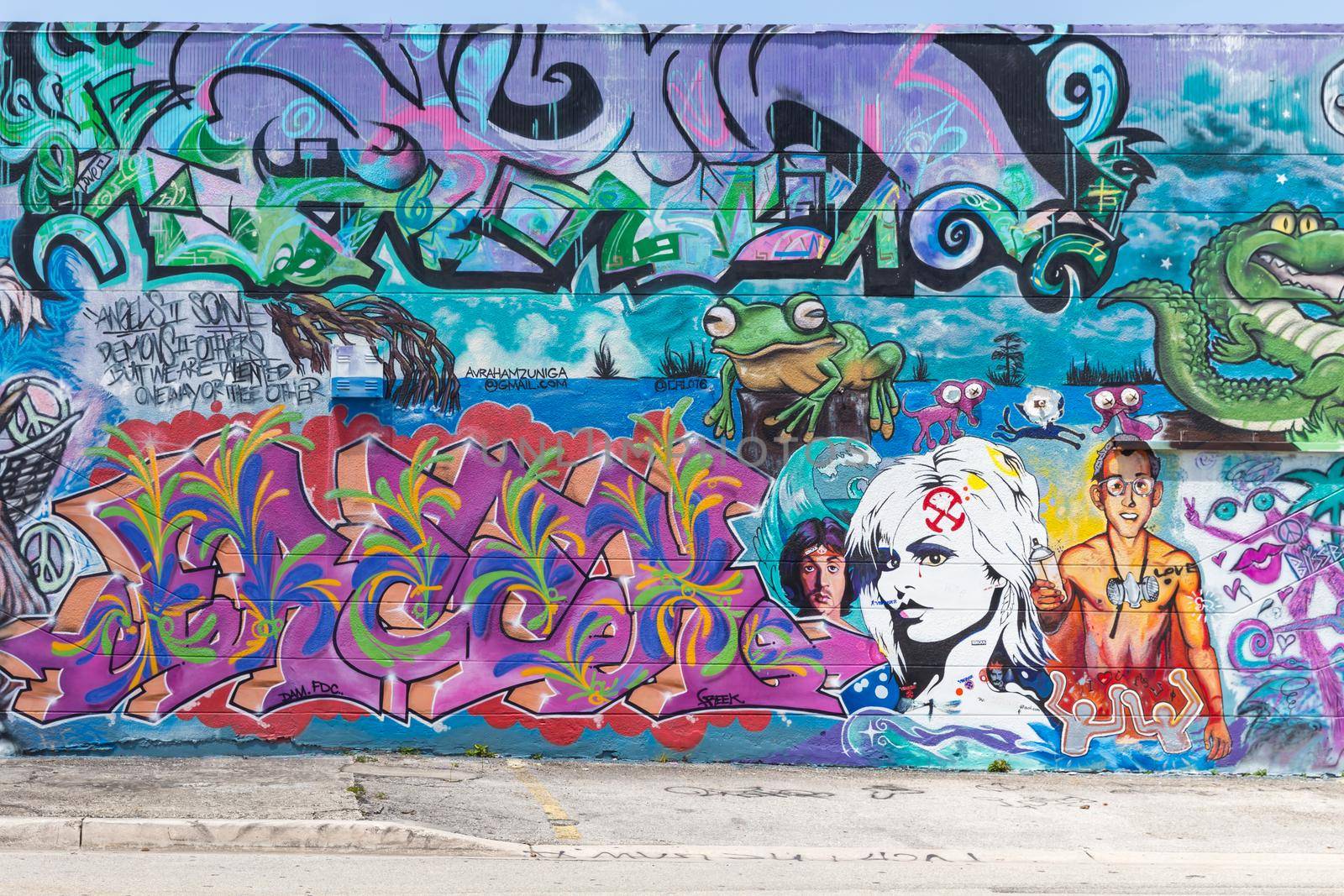 MIAMI, USA - AUGUST 29, 2014 : Graffiti on walls in graffiti district on August 29, 2014 in Miami. by Mariakray