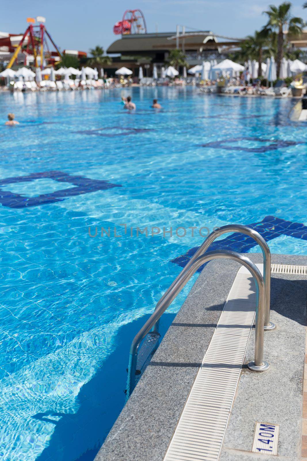 Metal ladder leading into the swimming pool