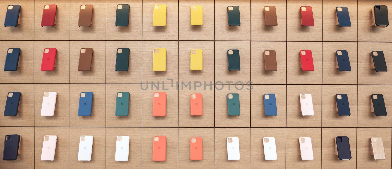 AVENTURA, FLORIDA, USA - SEPTEMBER 20, 2019: Apple iphone 11 series protection cases hanging on the wall in Apple store in Aventura Mall by Mariakray