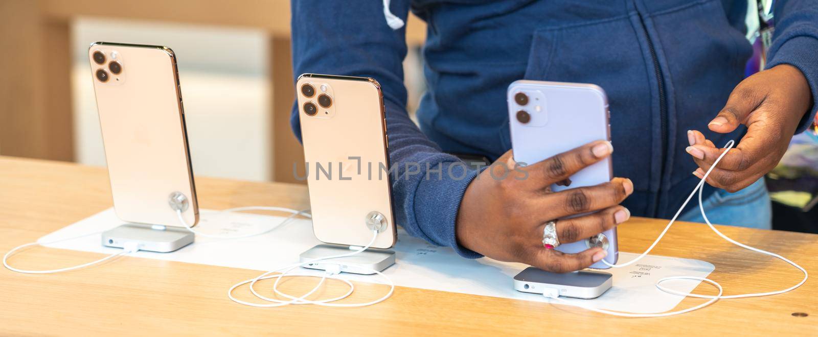 Aventura, Florida, USA - September 20, 2019: The iPhone 11, 11 Pro and Pro Max are displayed as the new smartphone by Apple goes on sale by Mariakray