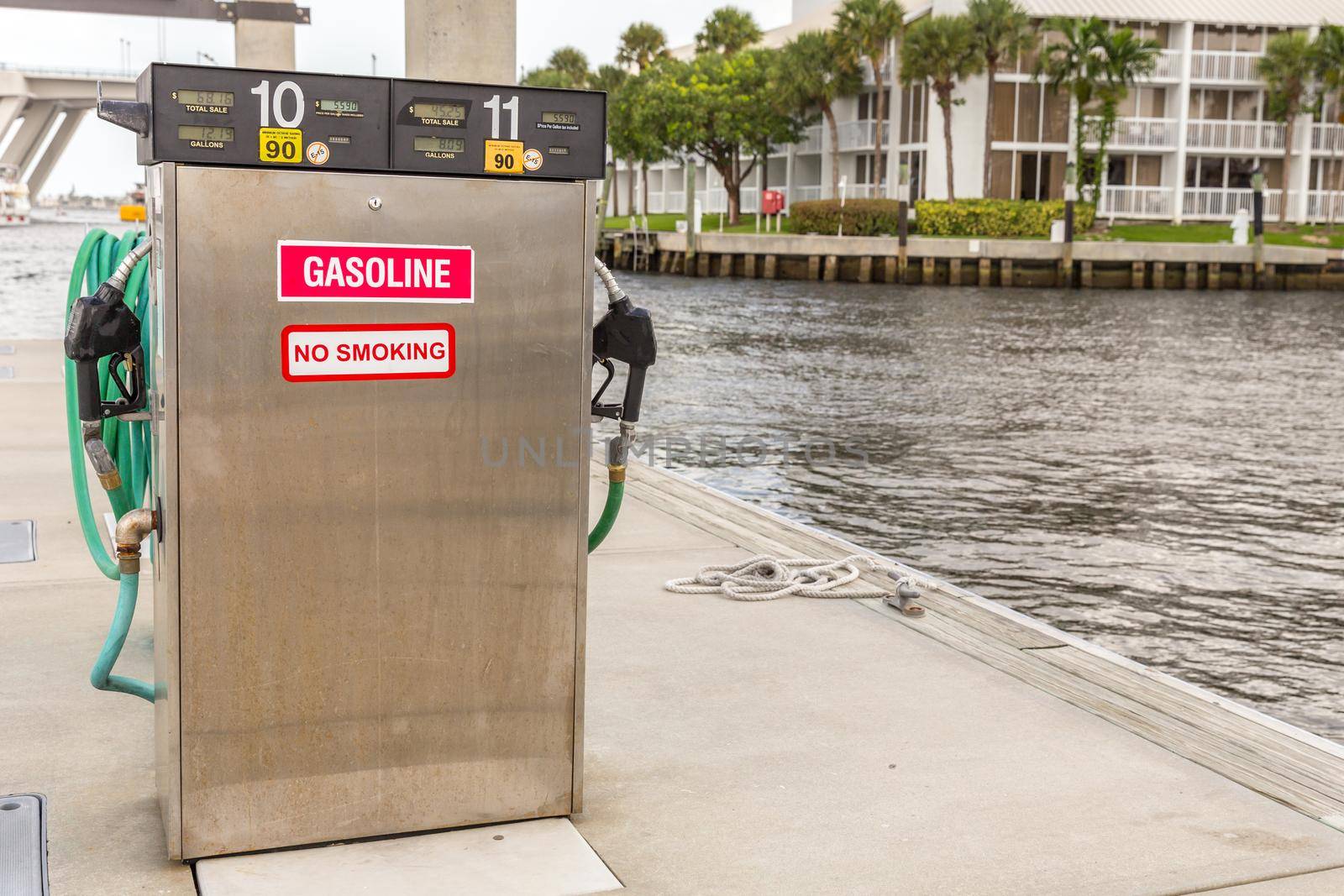 Gas station for ships and boats in the harbor. diesel dispenser. Energy and power concept.