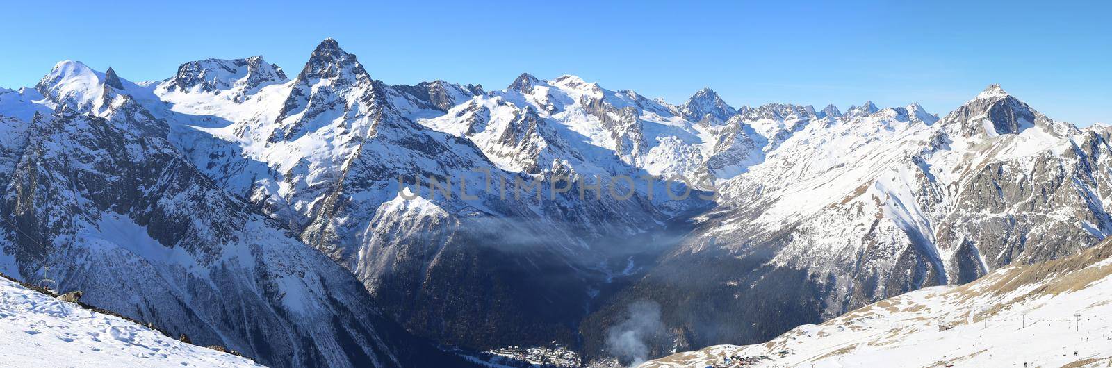 Panorama of winter mountains in Caucasus region, Dombai, Russia