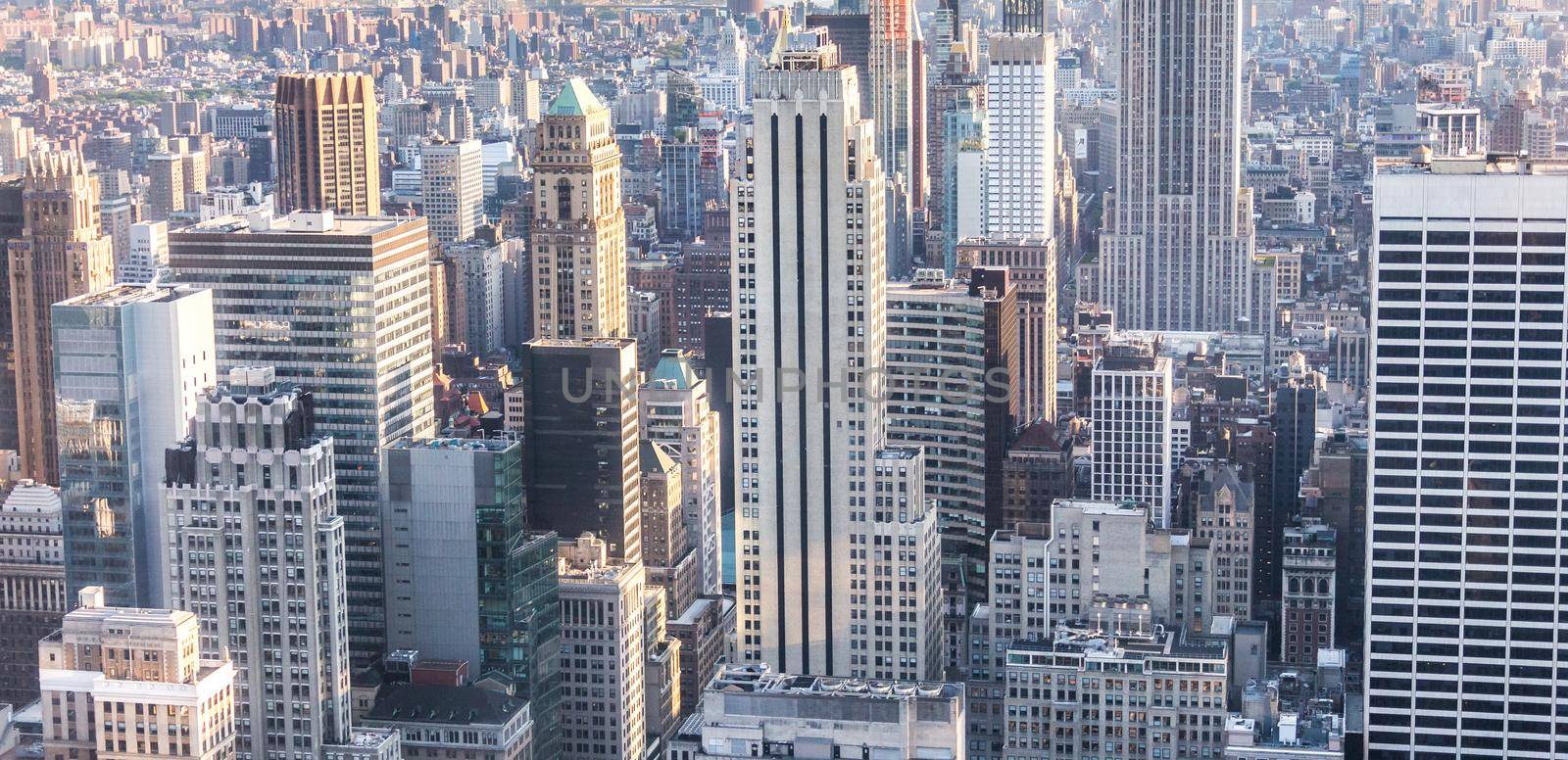 New york, USA - May 17, 2019: New York City Manhattan midtown aerial panorama view with skyscrapers and blue sky in the day. by Mariakray