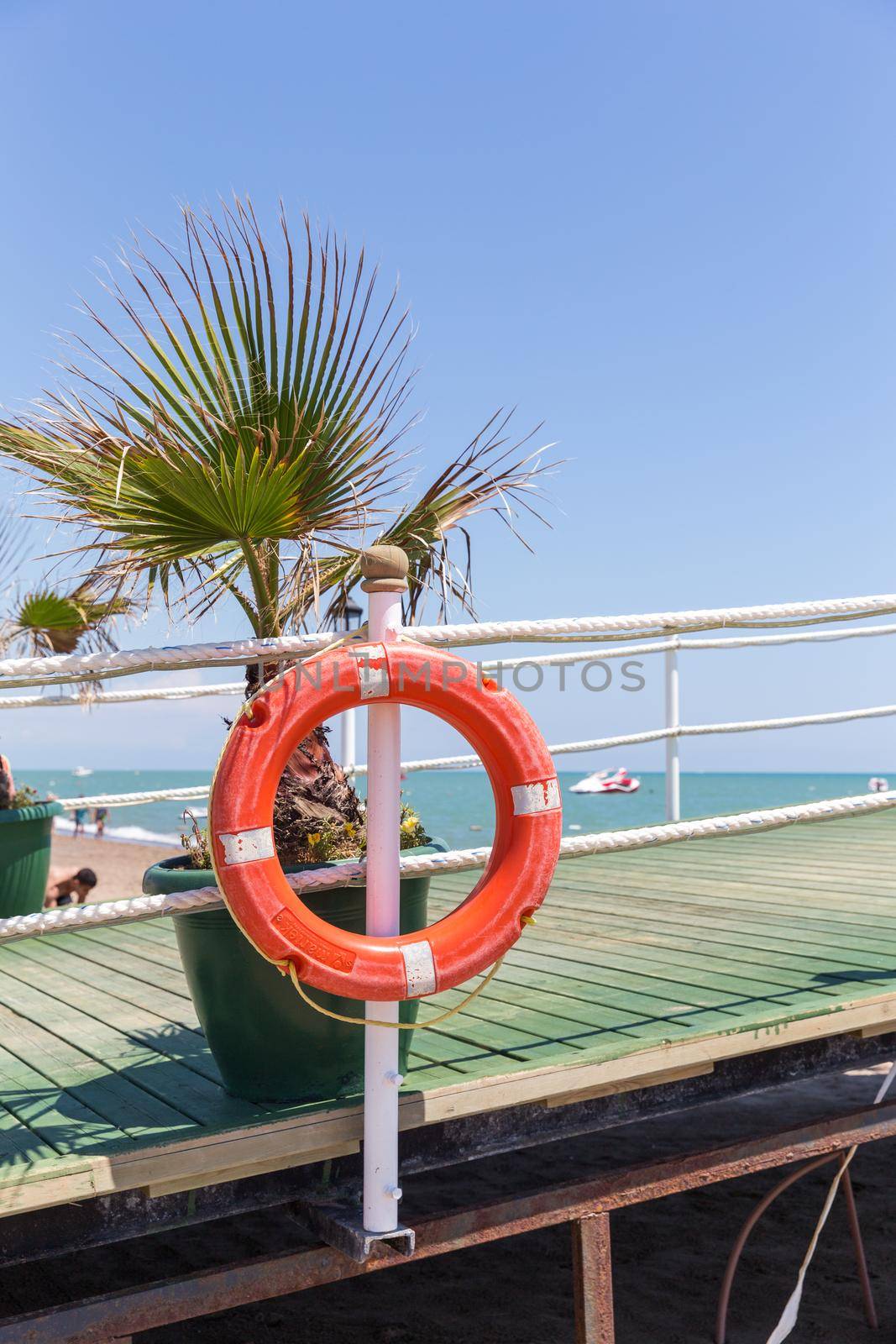 Life buoy hanging on the railing for safety