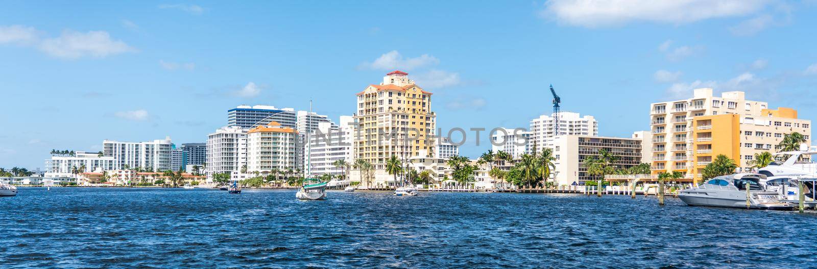 FORT LAUDERDALE, FLORIDA - September 20, 2019: Panorama of skyline of Fort Lauderdale from the canal by Mariakray