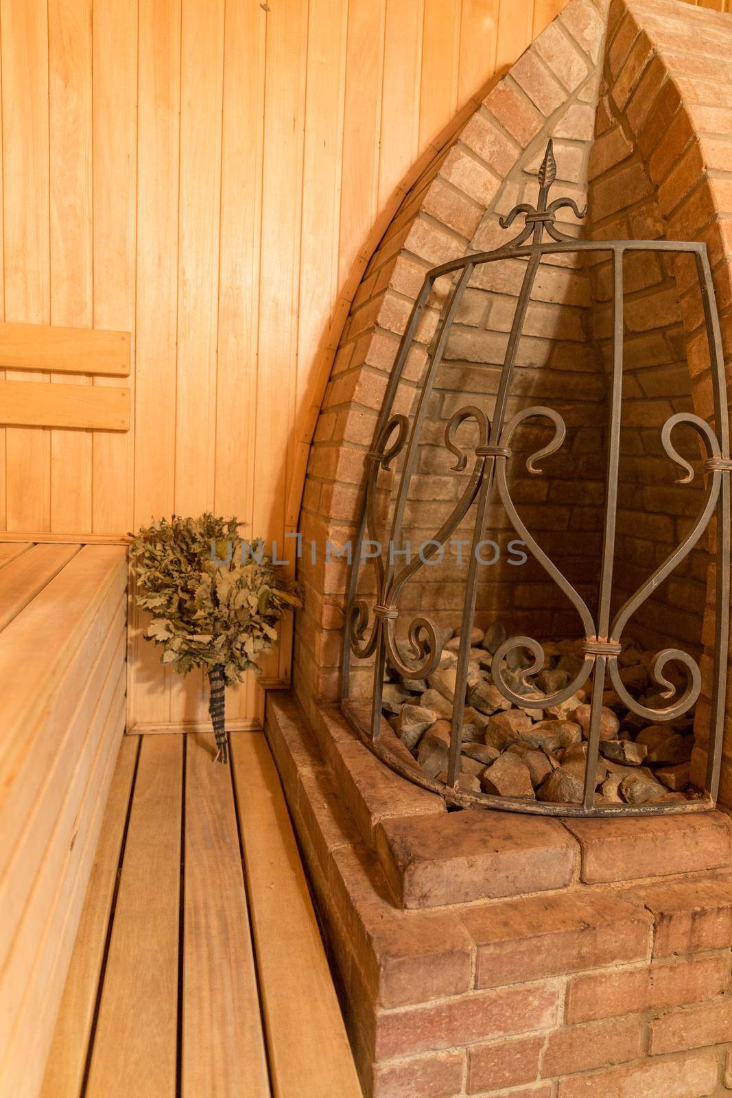 interior of a sauna with big stone oven